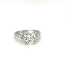 Oval Diamond GIA Certified 1.71 Ct. H VS1 Plat Setting with 0.35ct Pear Diamonds