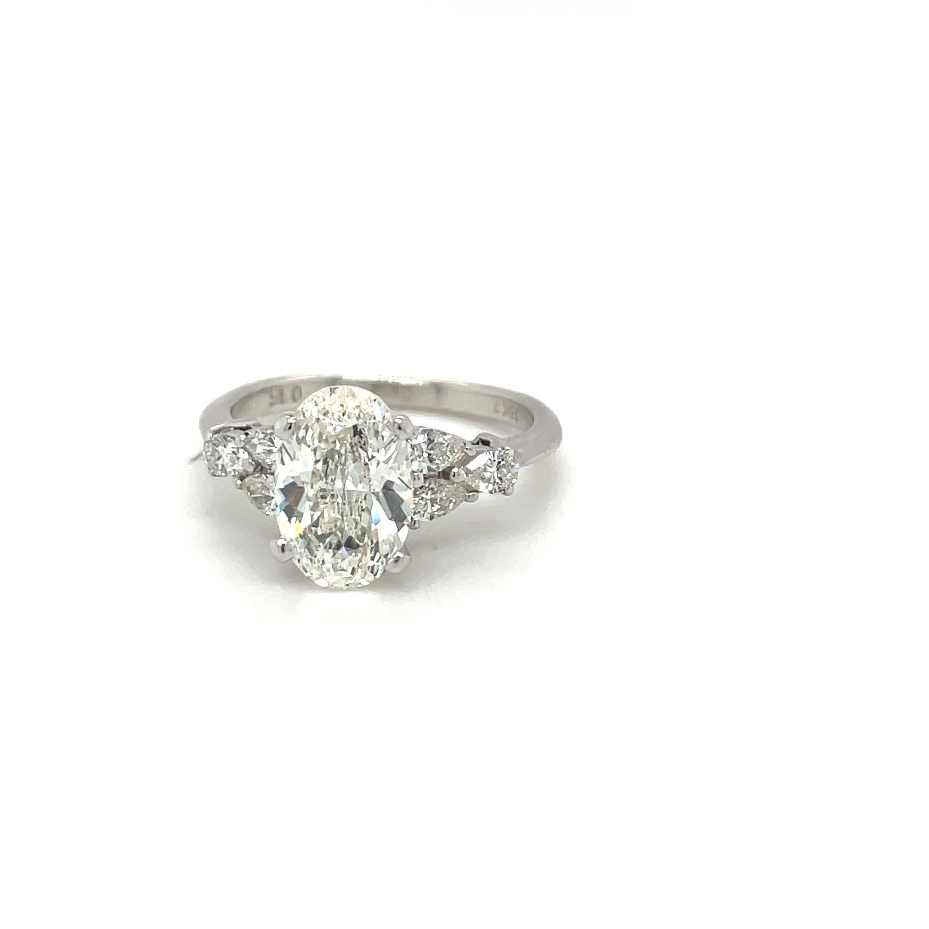 Oval Cut Oval Diamond GIA Certified 1.71 Ct. H VS1 Plat Setting with 0.35ct Pear Diamonds For Sale