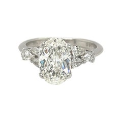 Oval Diamond GIA Certified 1.71 Ct. H VS1 Plat Setting with 0.35ct Pear Diamonds