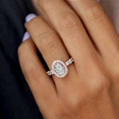 Oval Diamond Halo Engagement Ring with Diamond Pave Band