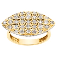 Oval Diamond ring in 14k yellow gold. 0.93 carats in pave set diamonds. 