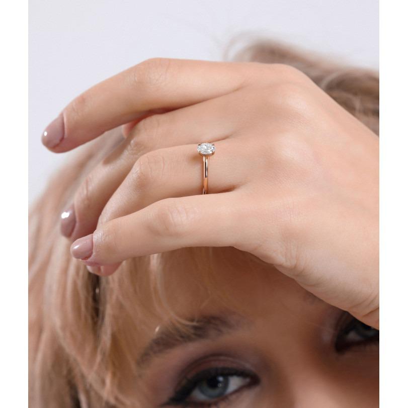 Einzelheiten zum Produkt :

- • Auf Bestellung gefertigt

- • Gold Kt: 14kt

- • 1.77GR

- • Verfügbare Goldfarben: Roségold, Gelbgold, Weißgold

- • 0.52ct Natürlicher Diamant im Ovalschliff

- • Diamant Farbe-Klarheit: F-G Farbe VS/SI Reinheit

-