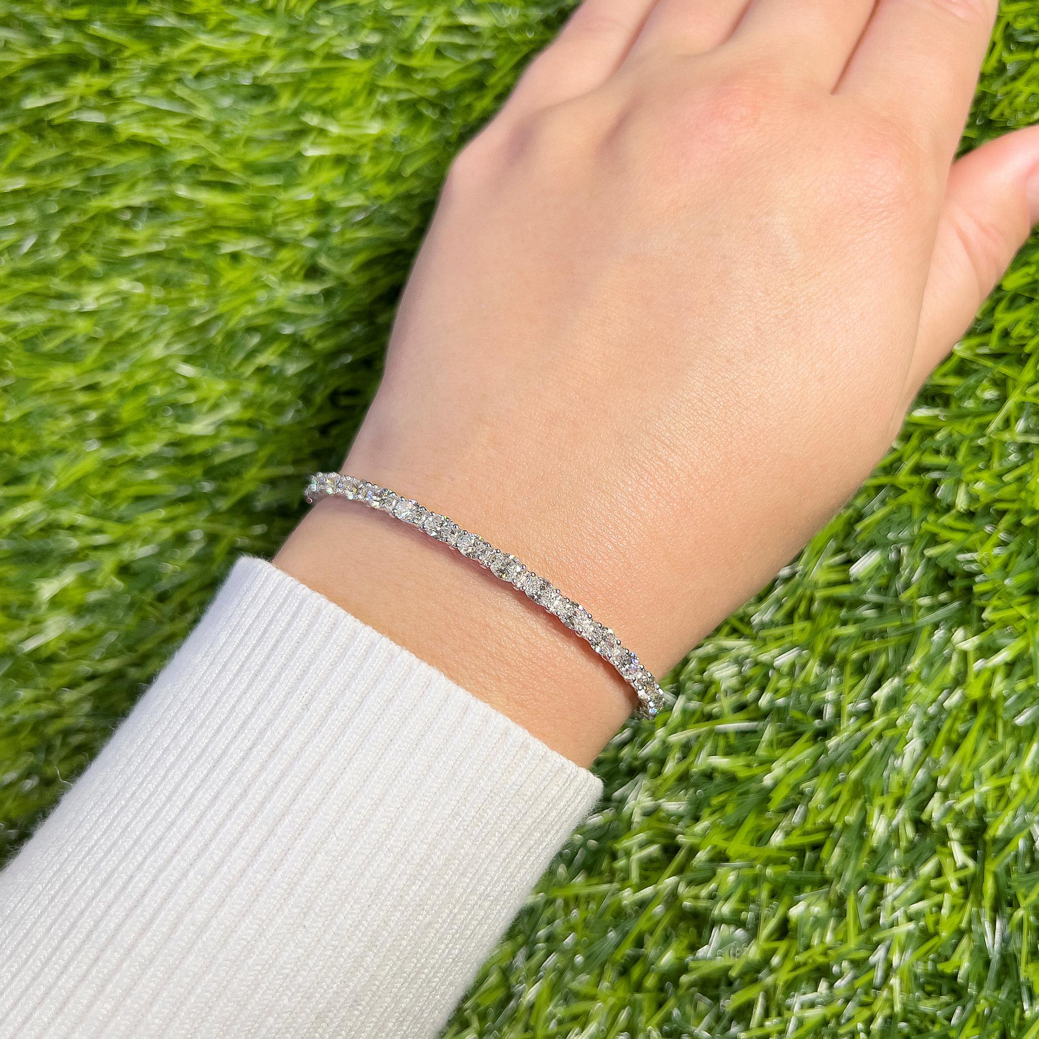 Contemporary Oval Diamond Tennis Bracelet 6.64 Carats 36 Diamonds 18K Gold For Sale