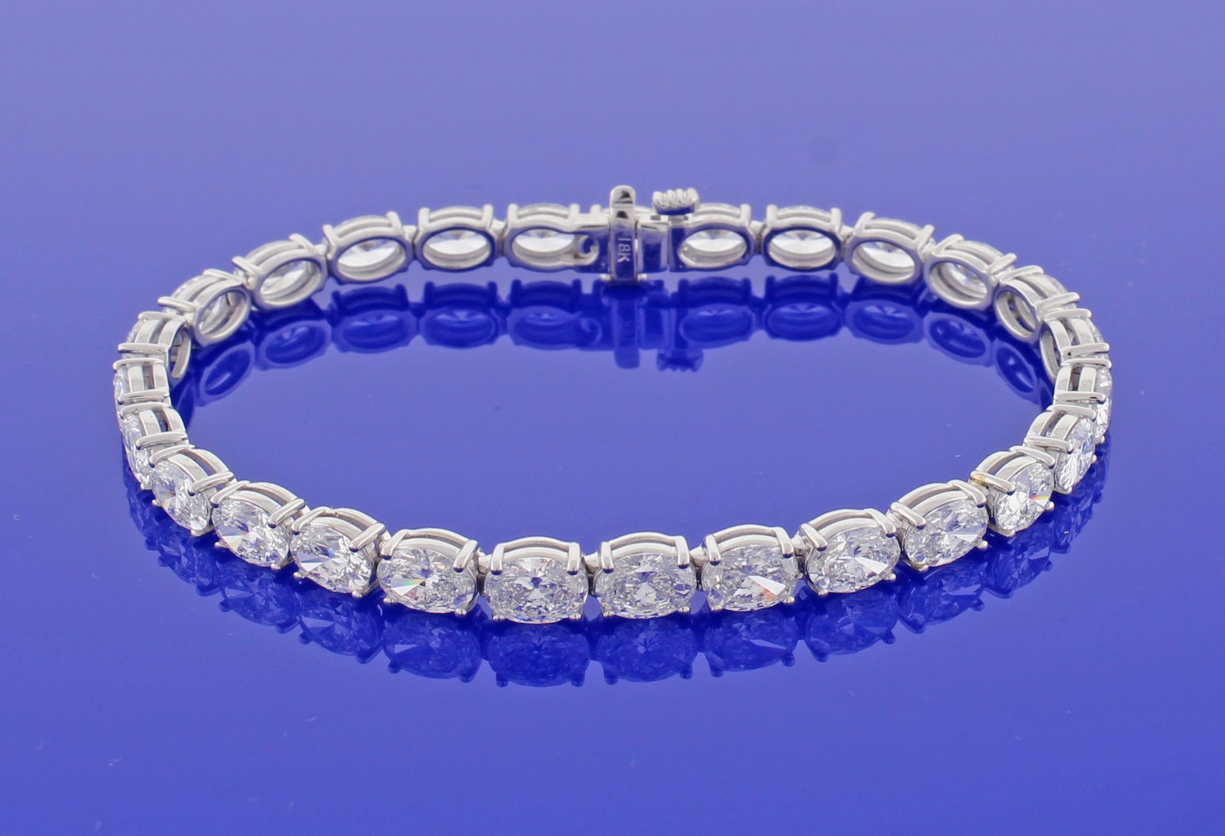 From Pampillonia jewelers, 27 perfectly matched oval diamonds lined up end to end form a straight line of diamonds. The 27 diamonds  weigh 11.50 carats  and are E-F color and are VS2+ clarity, set in 18 karat white gold. The bracelet is 6 ¾ inches