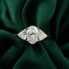 1.52 Carat Oval Trillion Diamond Three Stone Ring in 18K White Gold