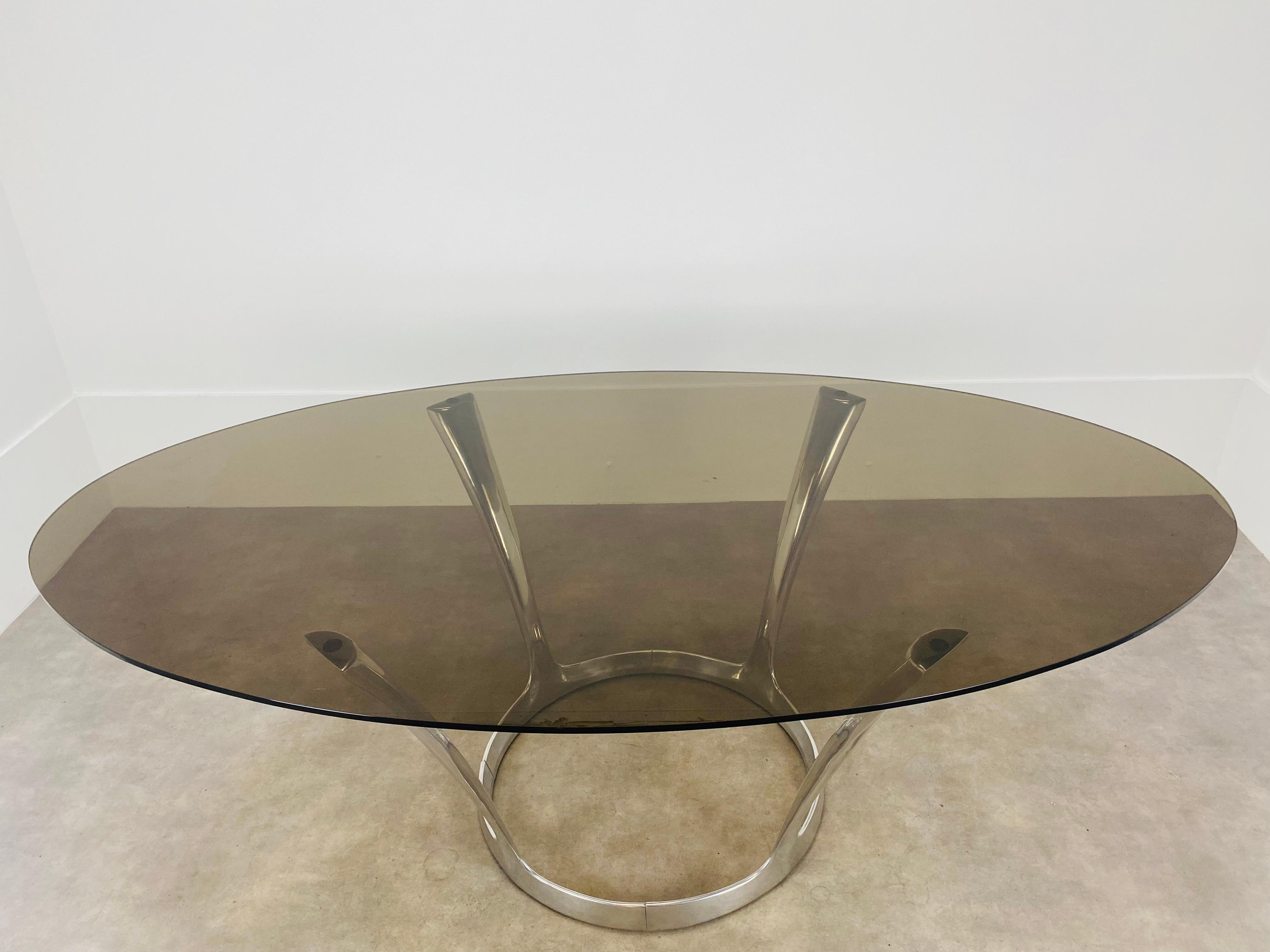 Mid-Century Modern Oval dining room table by Michel Charron, glass and aluminium  For Sale