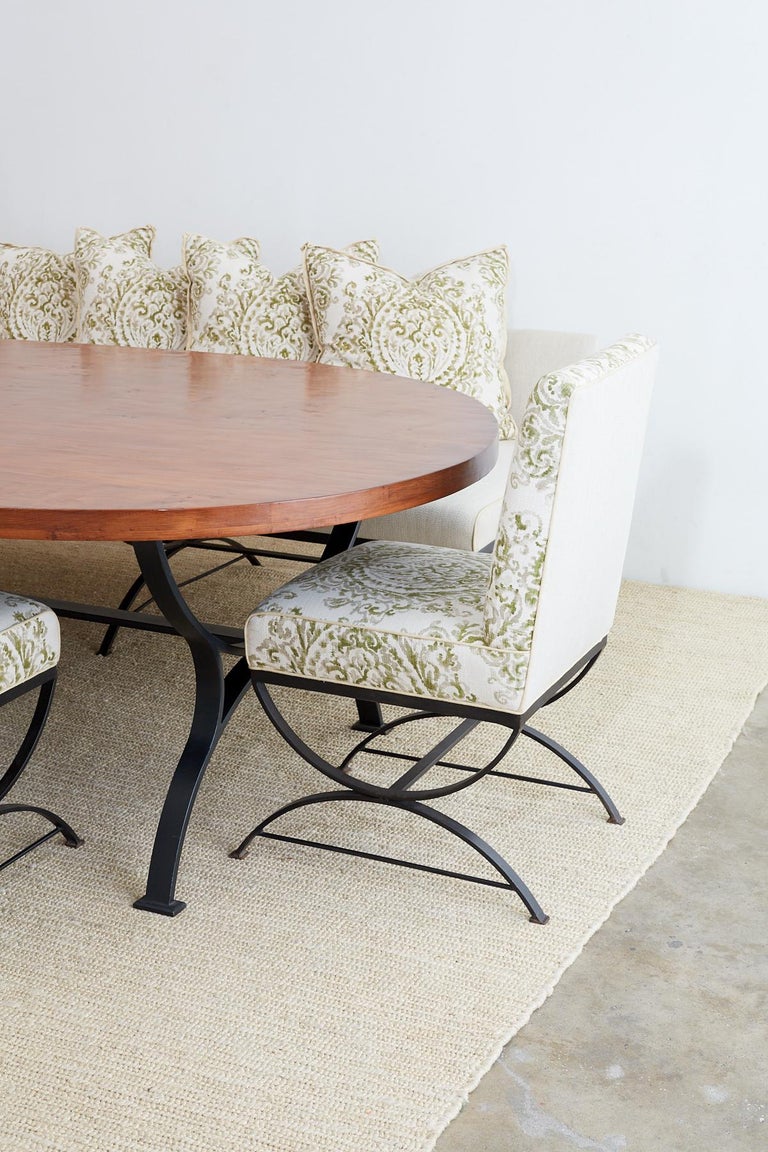 Oval Dining Suite with Iron Leg Chairs and Banquette at 1stDibs