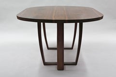 Oval Dining Table in Book-matched American Black Walnut by Jonathan Field.