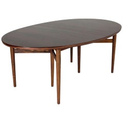 Table de salle à manger ovale avec rallonges par Arne Vodder