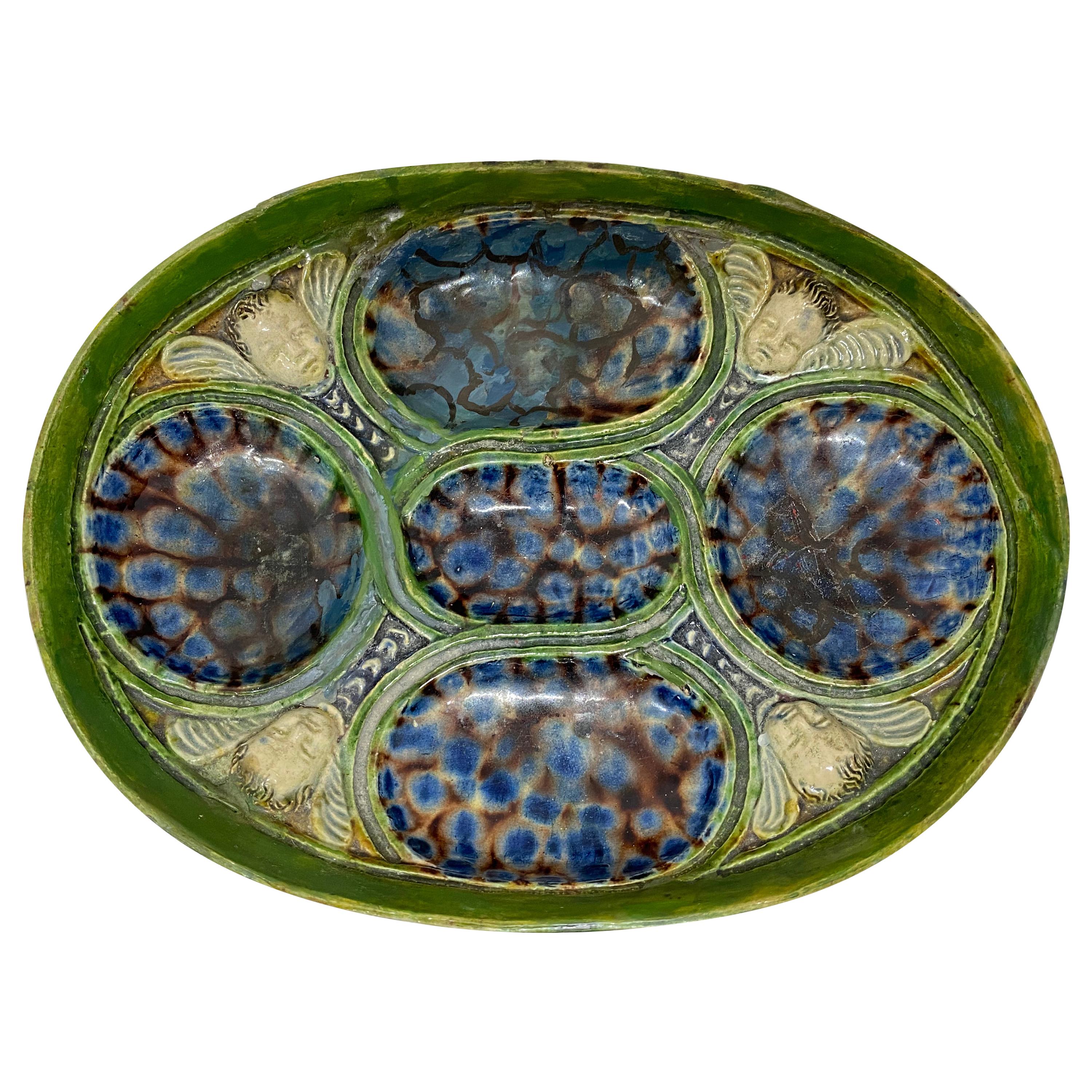 Oval Dish with Winged Putti, After Bernard Palissy, French, 17th Century For Sale