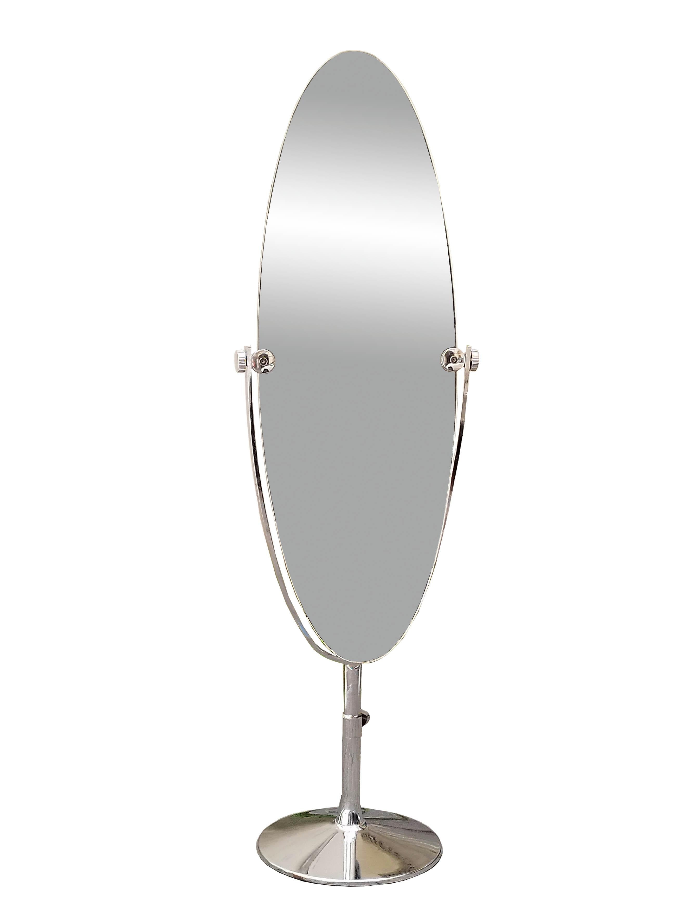 Large oval, bifrontal adjustable tilt floor mirror, with polished chrome metal frame with round base and chrome details 1970.Small flaws from one top of the mirror as pictured