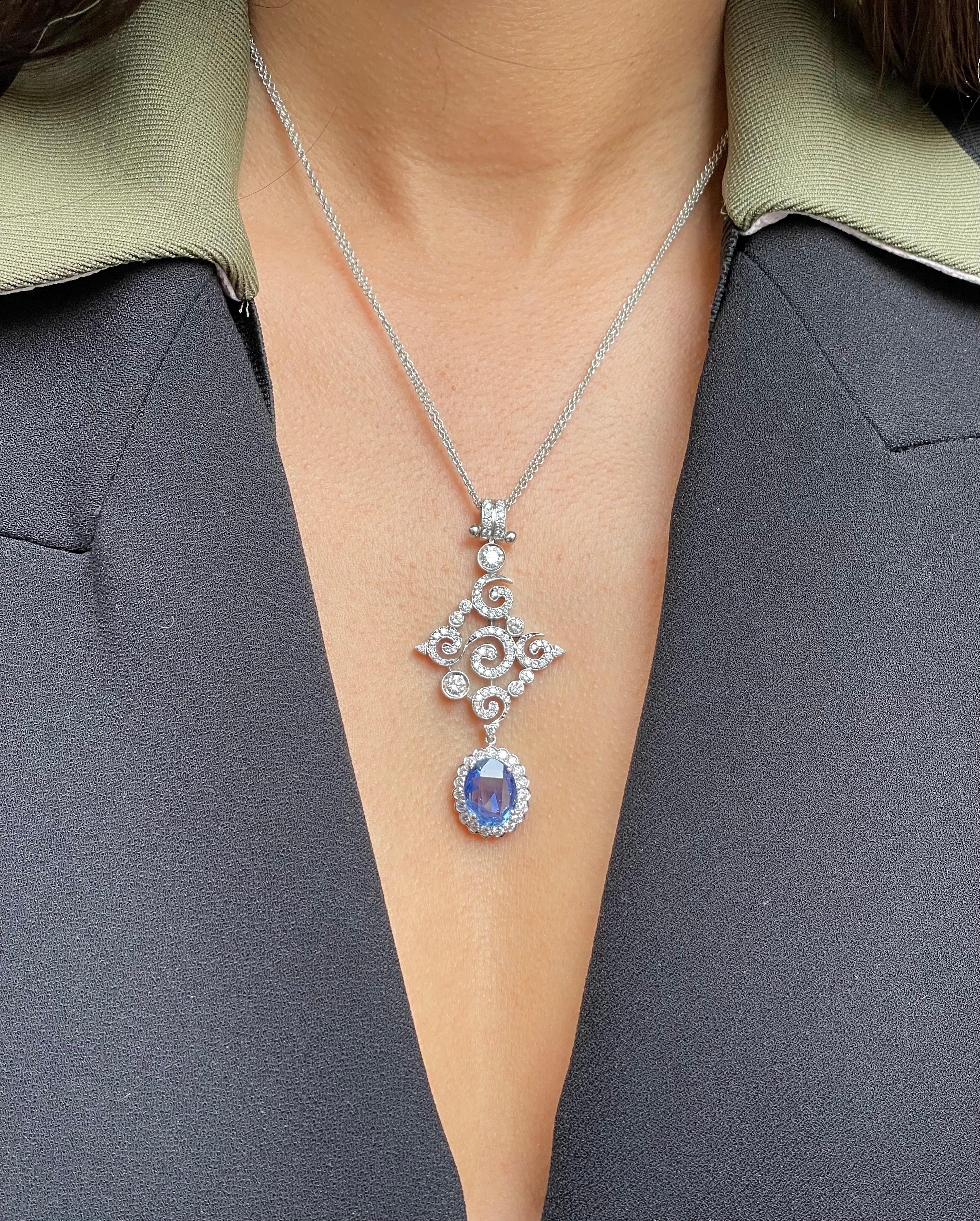 Lovely Oval-Drop NOT HEATED Sapphire Pendent with certificate , This lovely piece mounted on 18k white gold and approximately 3.00 carat Diamonds.