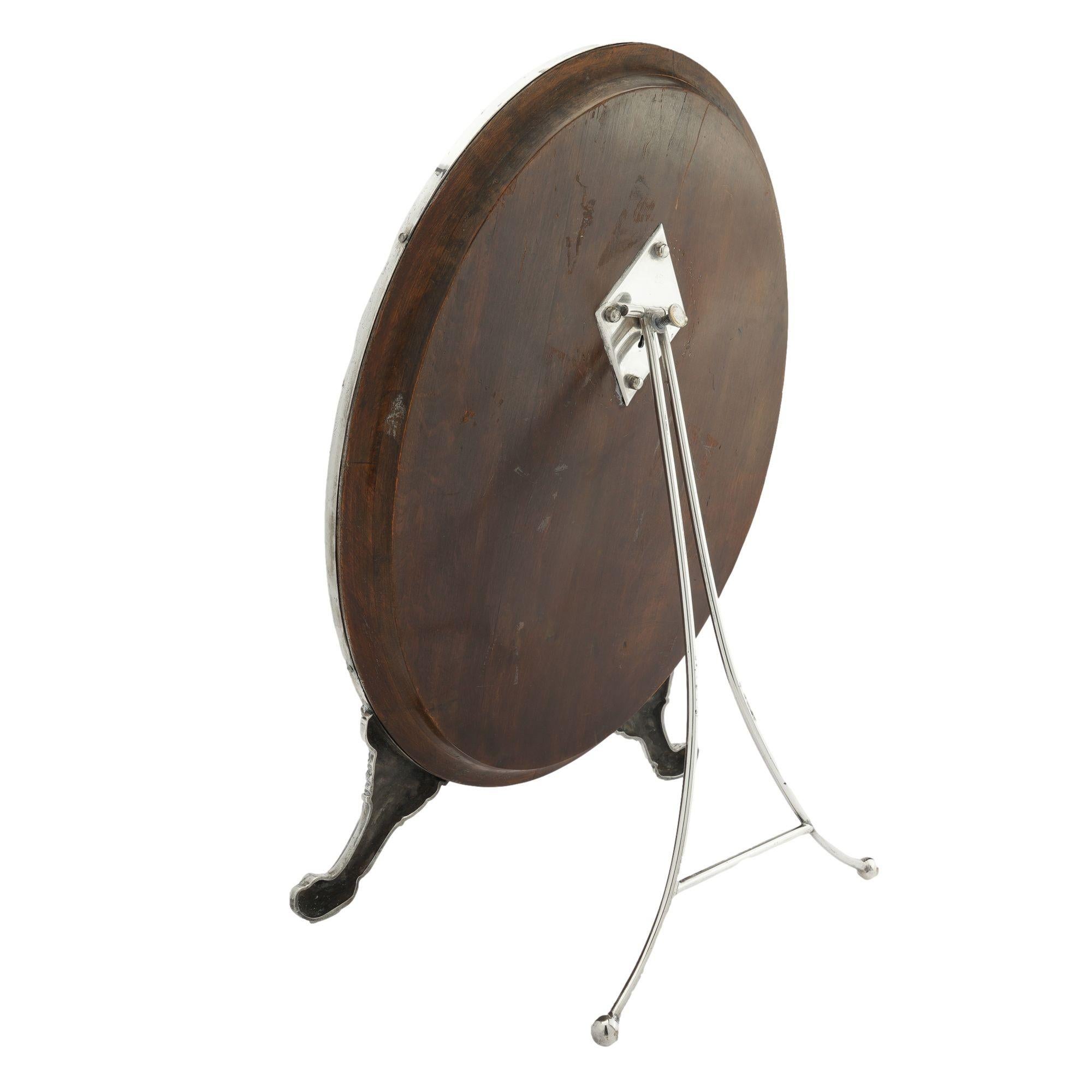 20th Century Oval easel back dressing mirror attributed to the Norblin Metal Works, 1880-1900