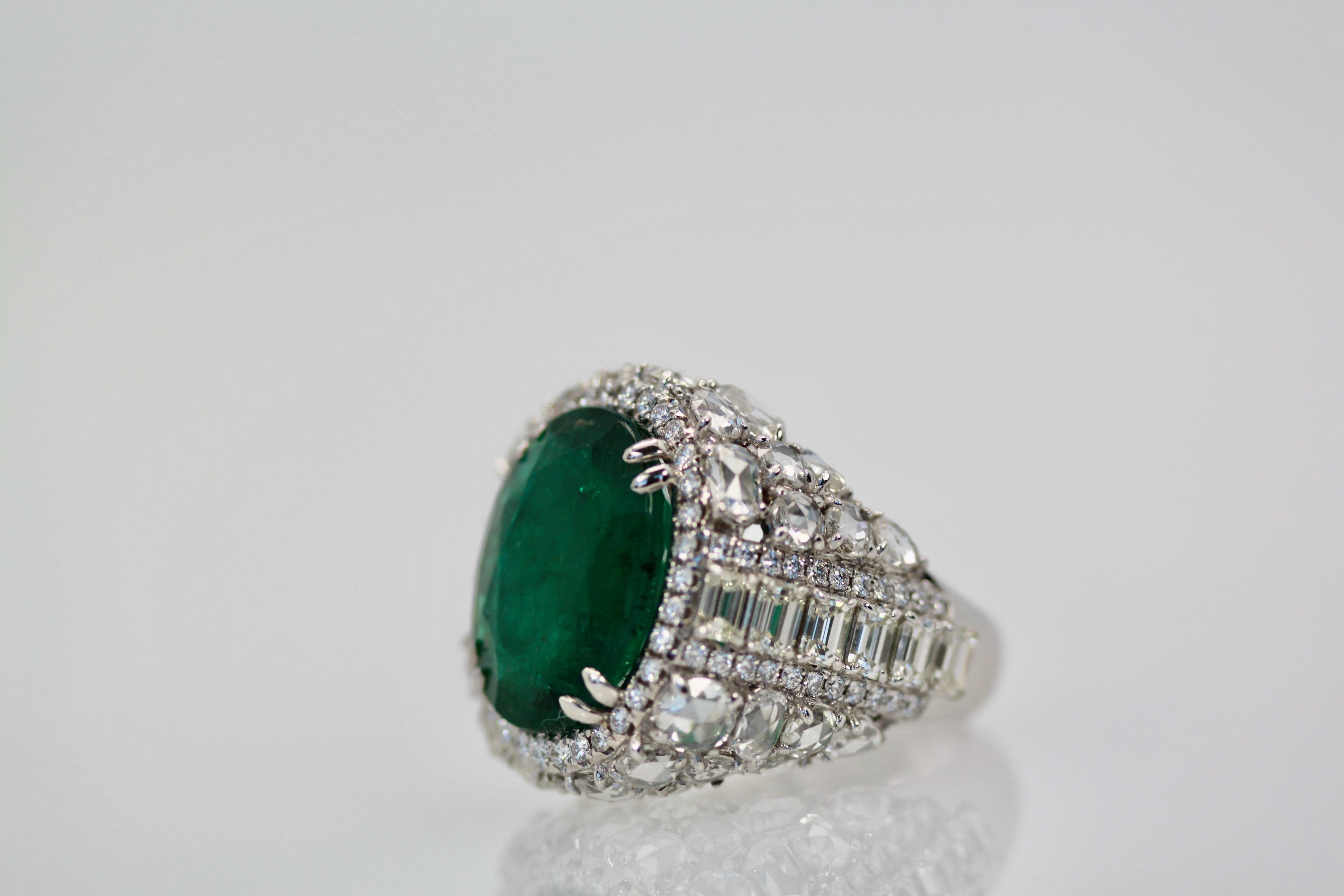 Oval Cut Oval Emerald 12.25 Carat Diamond Surround 8.85 Carat Total Weight 21.10 Carat For Sale