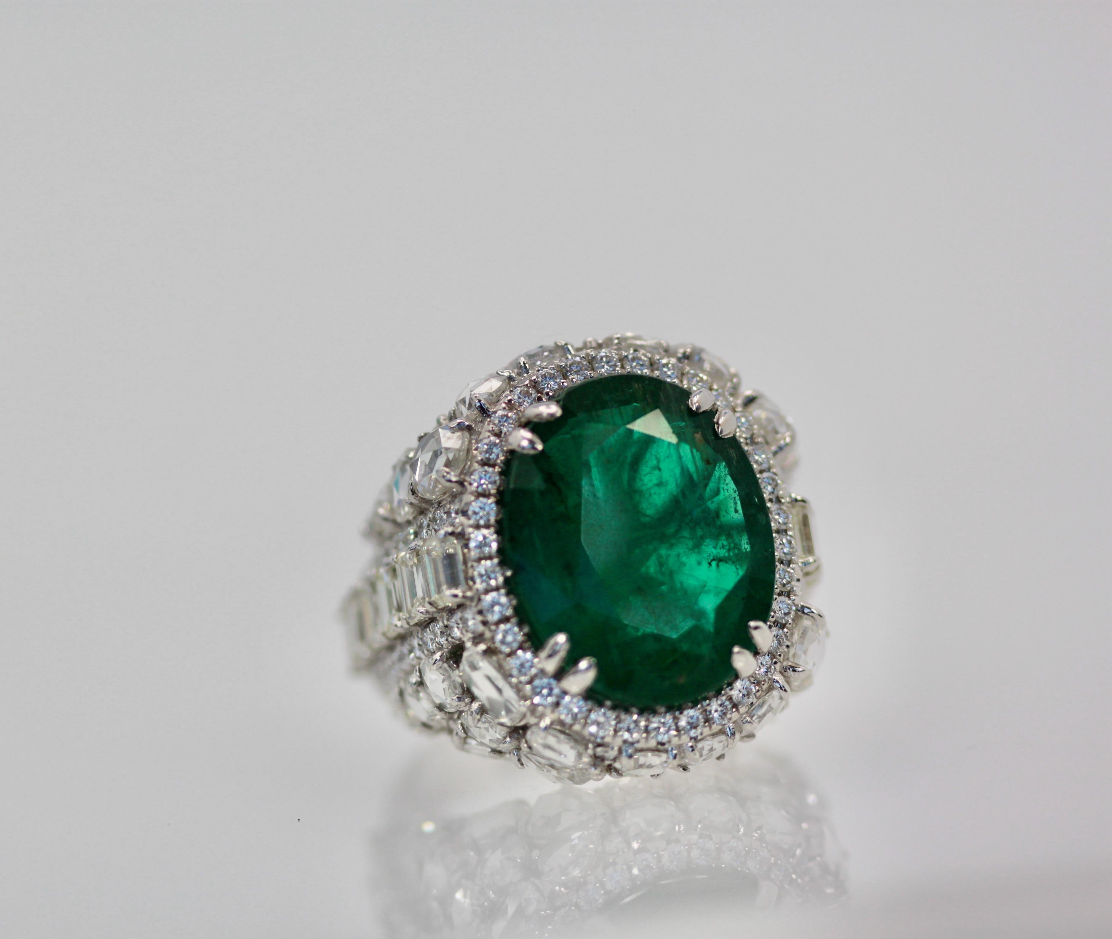 Women's or Men's Oval Emerald 12.25 Carat Diamond Surround 8.85 Carat Total Weight 21.10 Carat For Sale