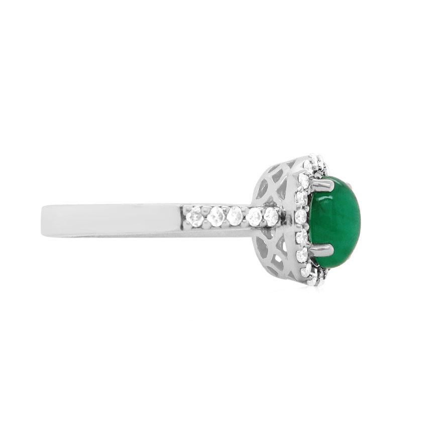 Contemporary Oval Emerald 14 Karat White Gold Diamond Halo Ring For Sale