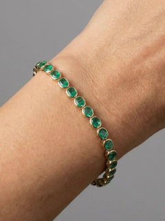 Bracciale in oro giallo con smeraldo ovale da 9,28 carati