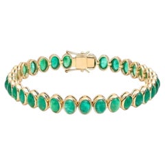 Bracelet de tennis en or jaune 14K (18K sur mesure) avec émeraude ovale