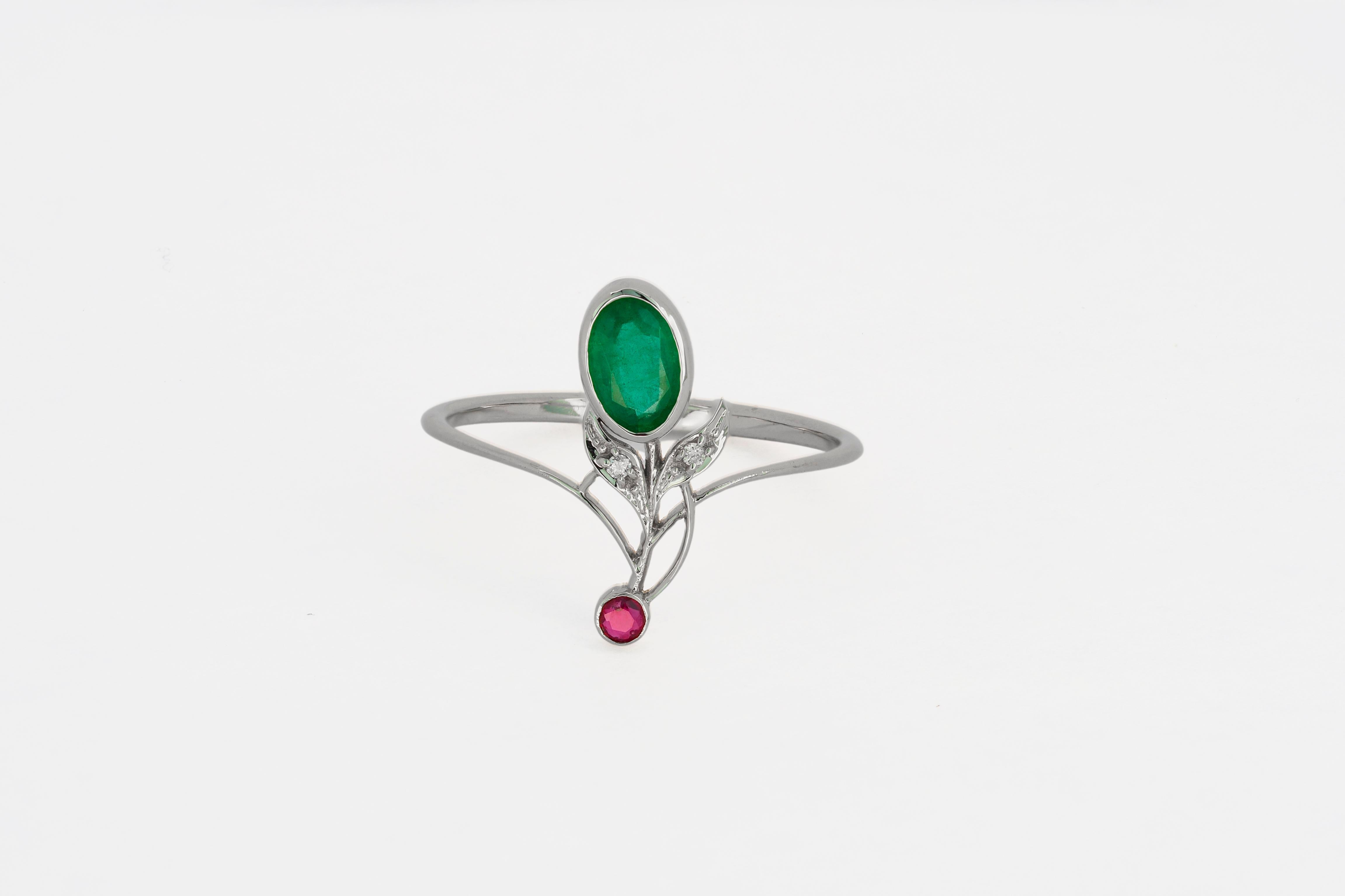Modern Oval Emerald 14k gold ring.  For Sale