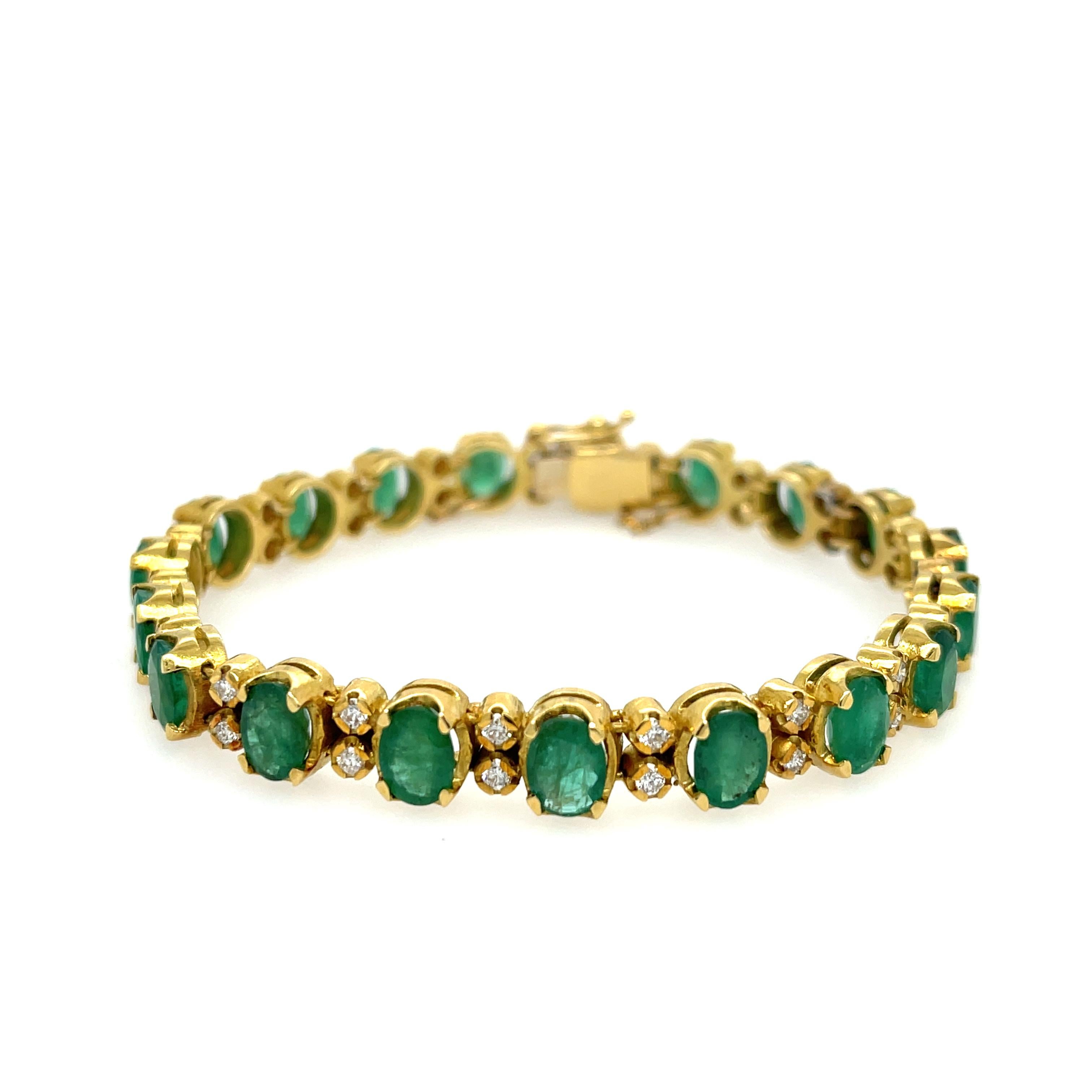 Oval Emerald and Diamond Bracelet in 18K Yellow Gold. The bracelet features 19 oval cut emeralds with 16.3ctw and 38 round diamonds with 1.22ctw.
7