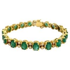 Ovales Armband aus 18 Karat Gelbgold mit Smaragd (16,30 Karat) und Diamanten