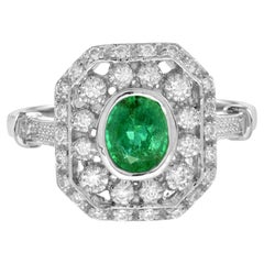 Oval Emerald and Diamond Art Deco Style Octagon Shape Halo Ring in 18K Gold
