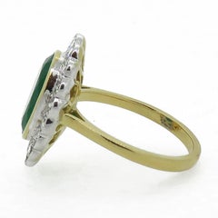 Oval Emerald and Diamond Cluster Ring 18 Karat Yellow and White Gold
