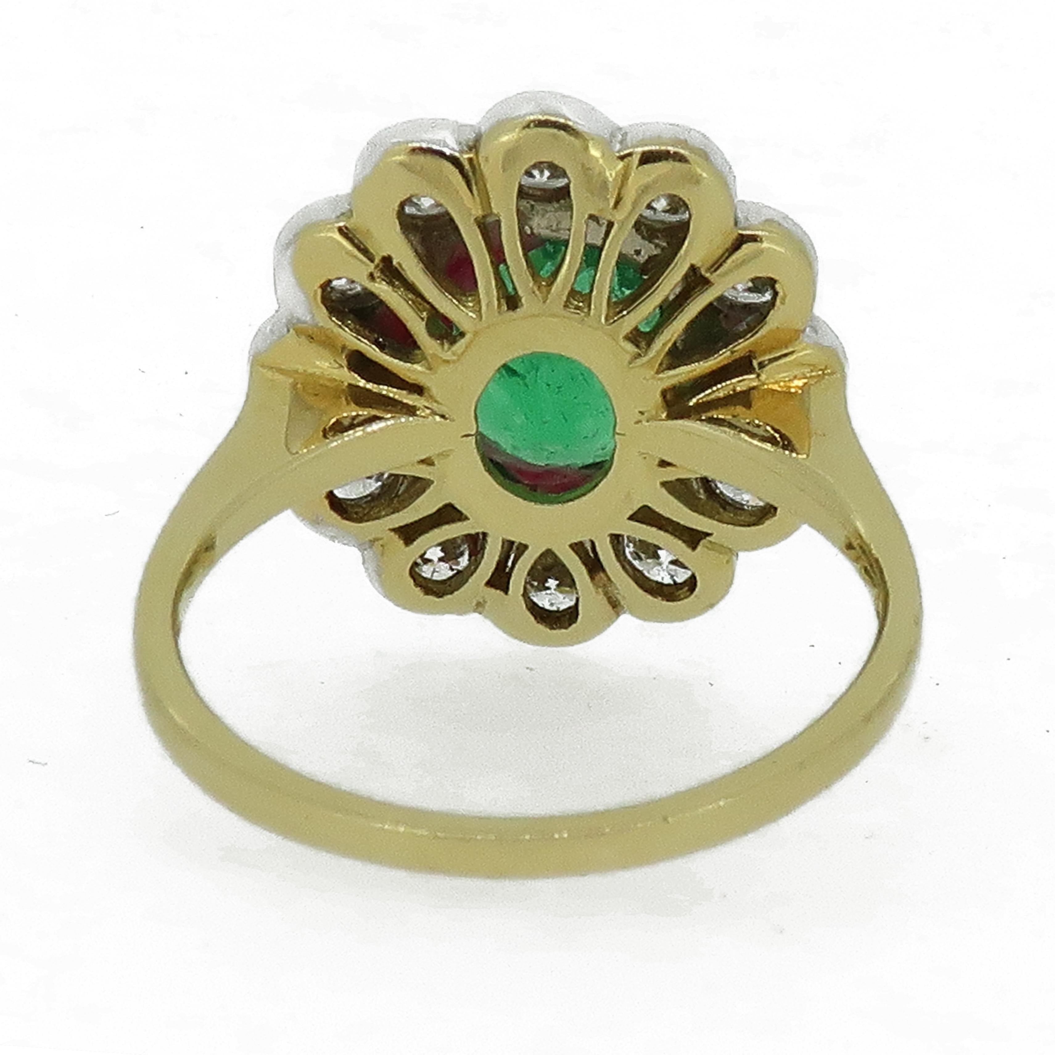Art Deco Oval Emerald and Diamond Cluster Ring 18 Karat Yellow and White Gold For Sale