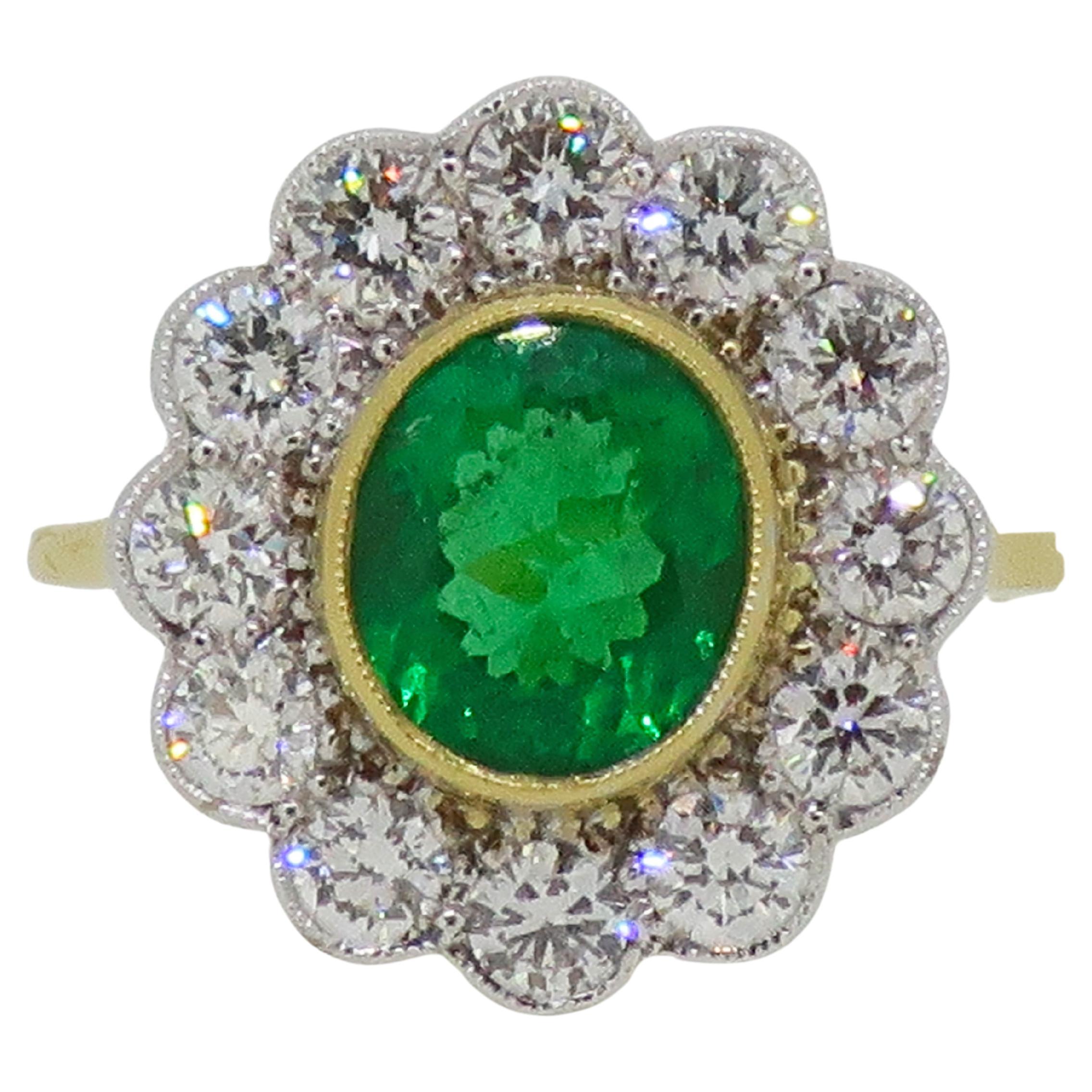 Oval Emerald and Diamond Cluster Ring 18 Karat Yellow and White Gold For Sale