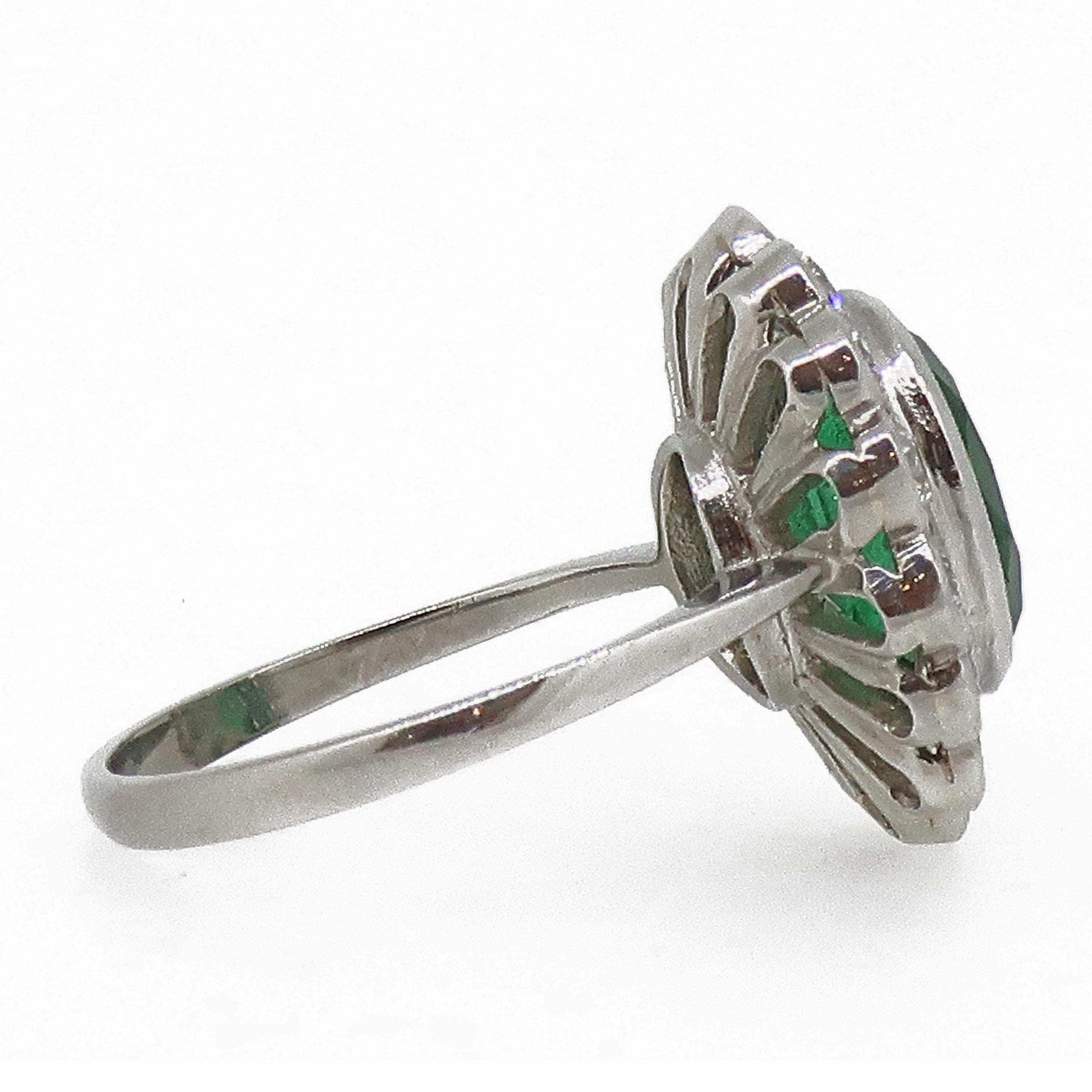 Oval Cut Oval Emerald and Diamond Cluster Ring Platinum
