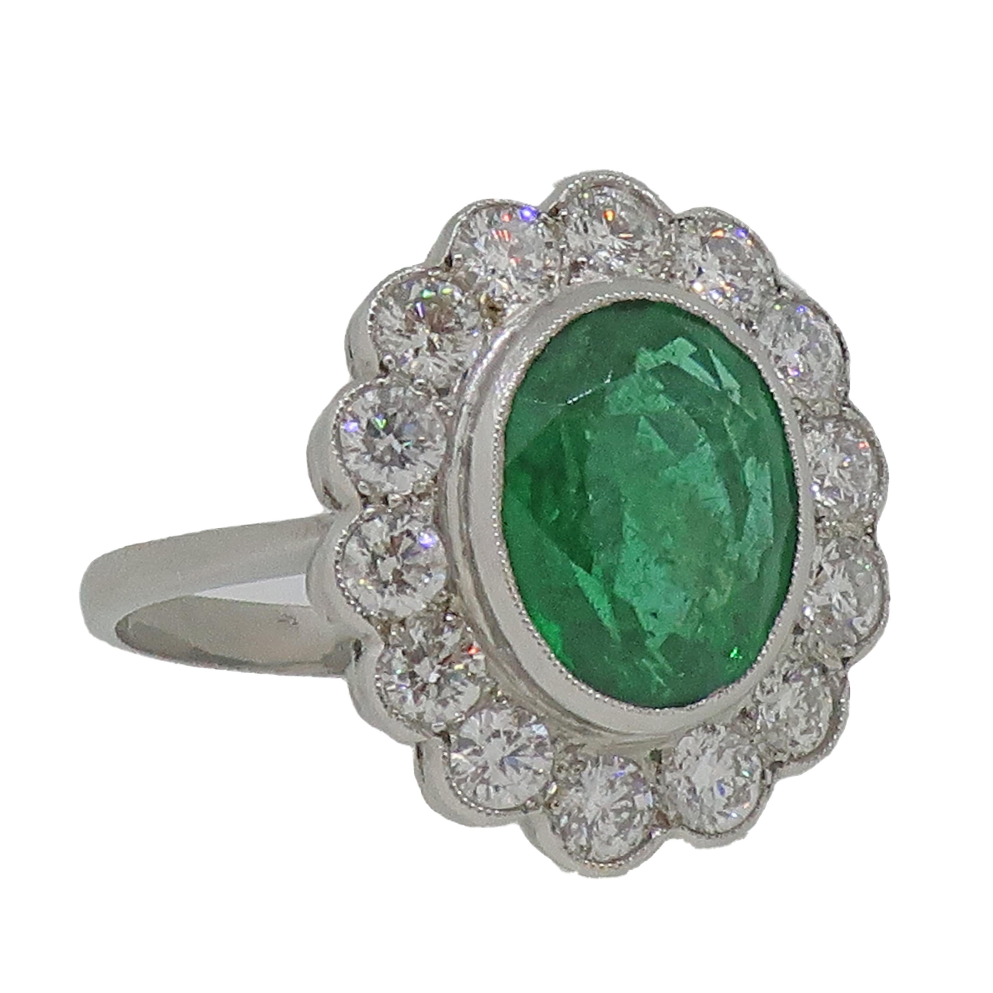 Women's Oval Emerald and Diamond Cluster Ring Platinum