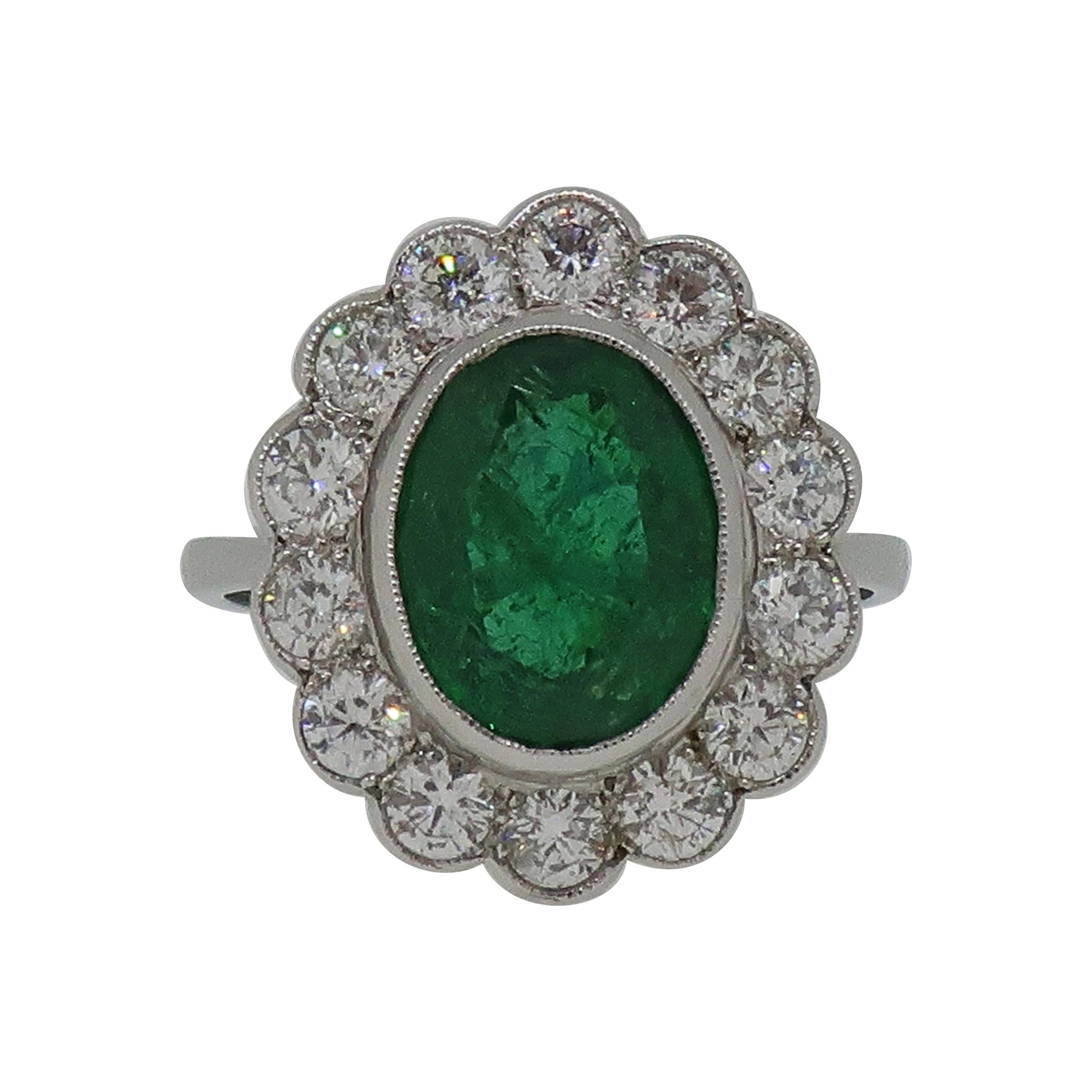 Oval Emerald and Diamond Cluster Ring Platinum