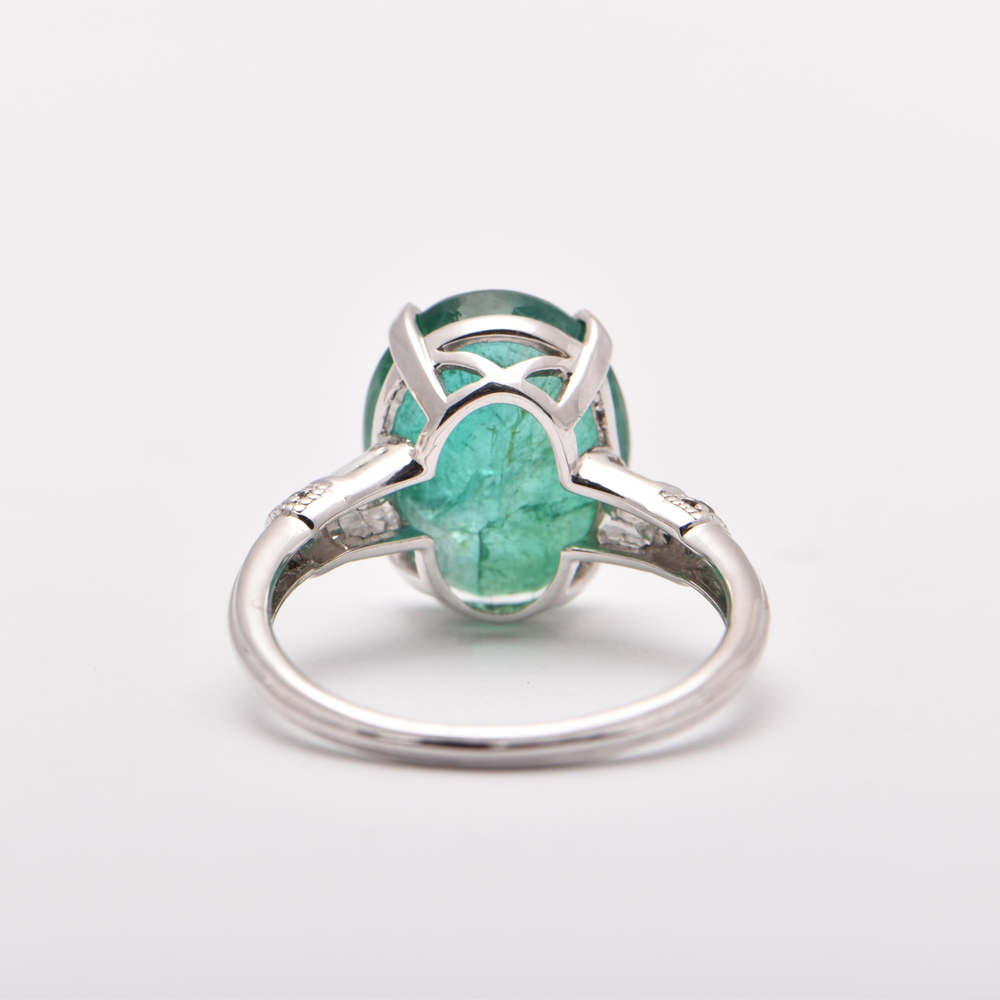 Women's Oval Emerald and Diamond Cocktail Ring in Platinum For Sale