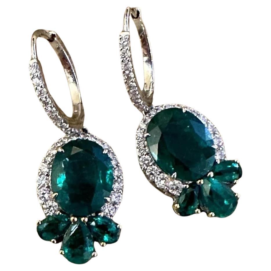 Oval Emerald and Diamond Drop Earrings in 18k White Gold For Sale