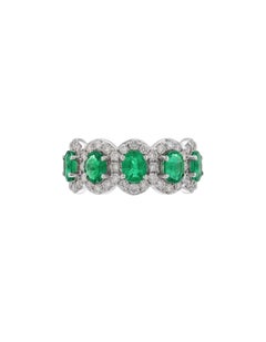 Oval Emerald and Diamond Half Eternity Band Ring In 18 Karat Gold.
