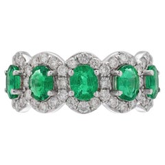 Oval Emerald and Diamond Half Eternity Band Ring In 18 Karat Gold.