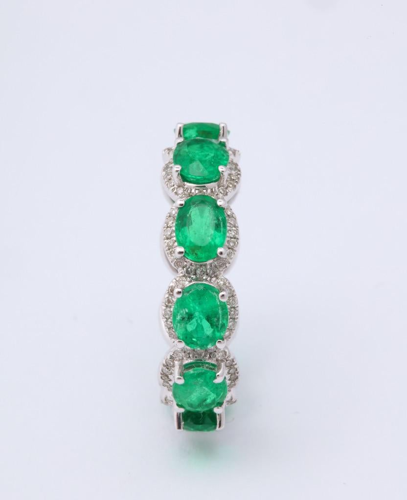 Oval Emerald and Diamond Halo Eternity Band Ring 1