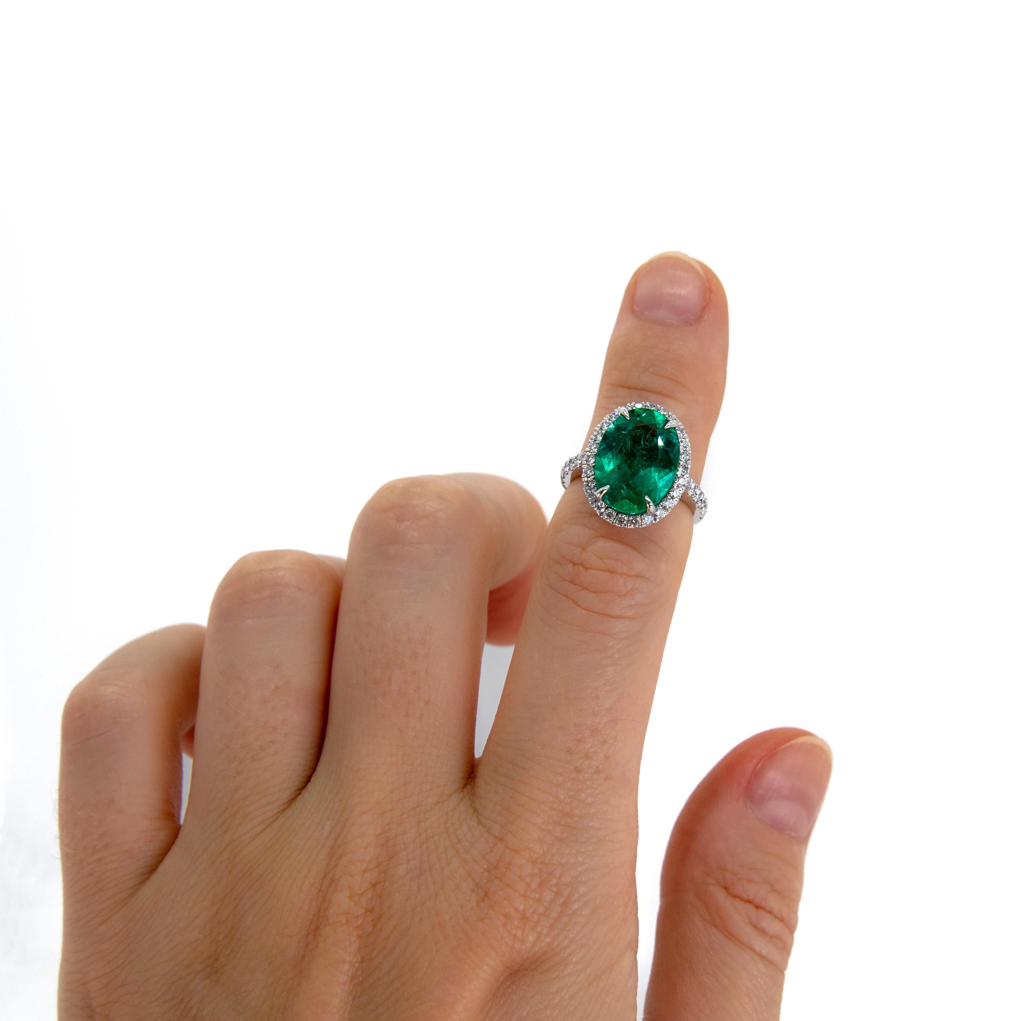 For Sale:  Oval Emerald and Diamond Halo Ring 3