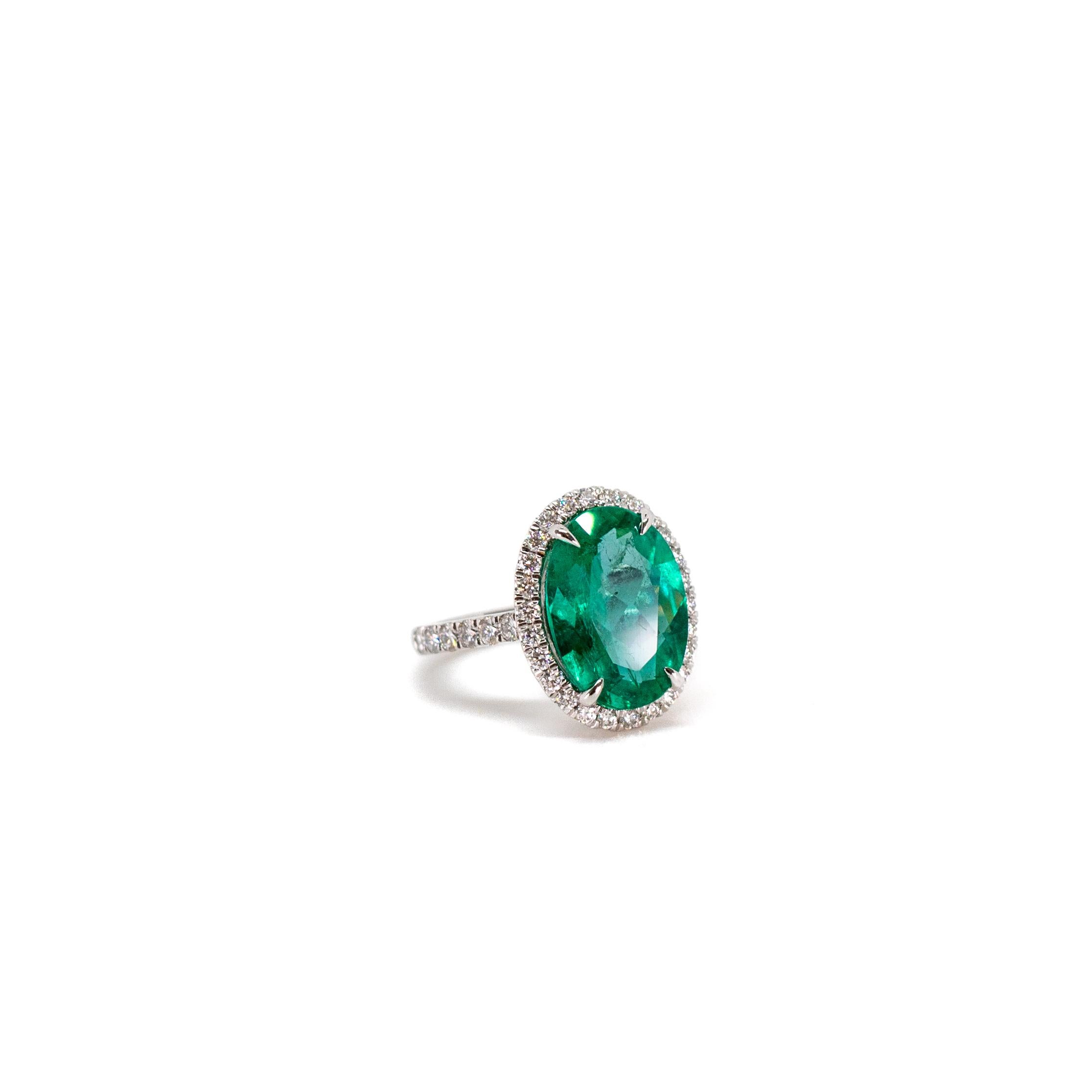 For Sale:  Oval Emerald and Diamond Halo Ring 4