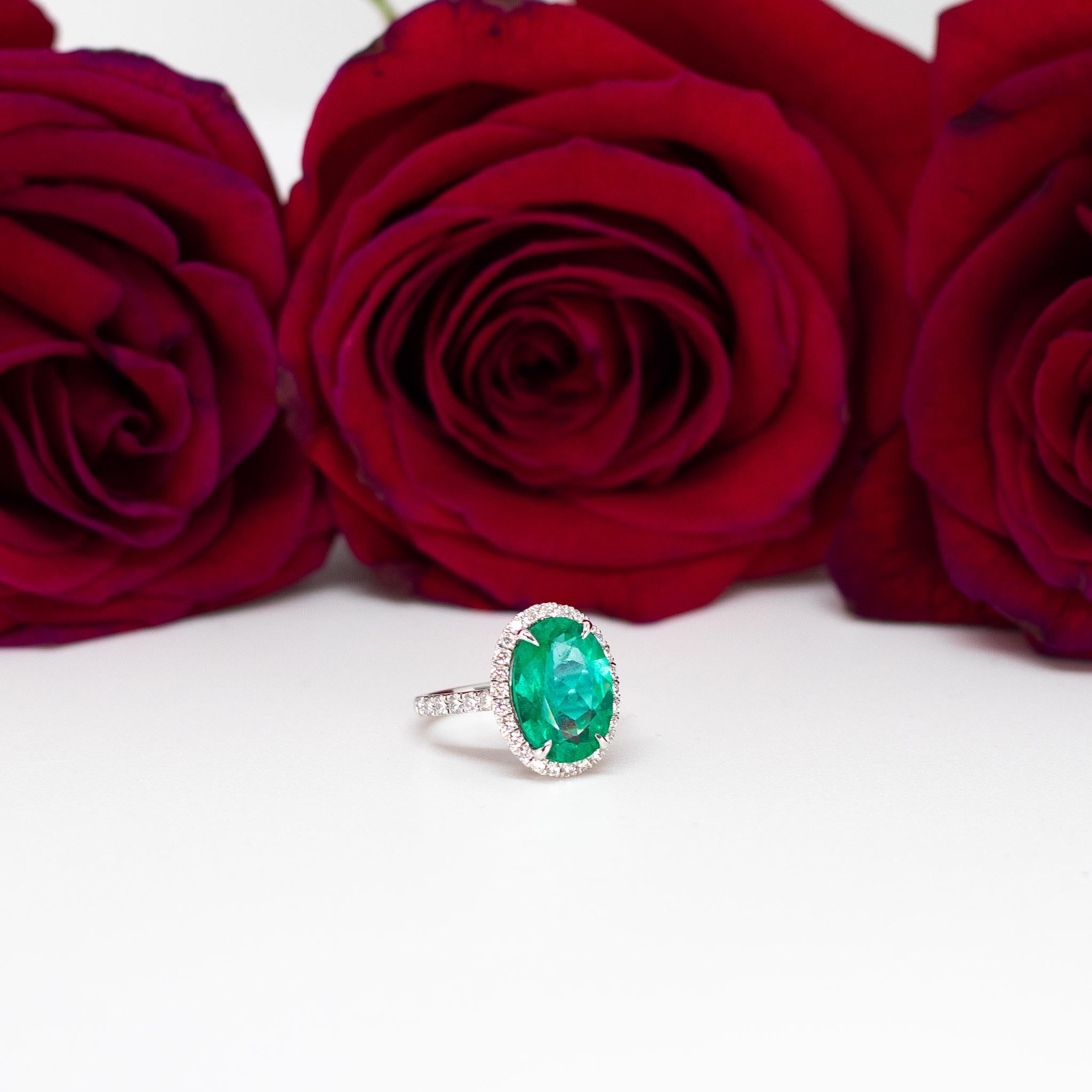For Sale:  Oval Emerald and Diamond Halo Ring 5