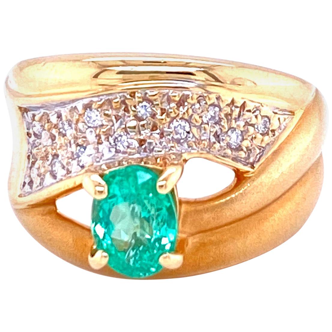 Oval Emerald and Diamond Ring