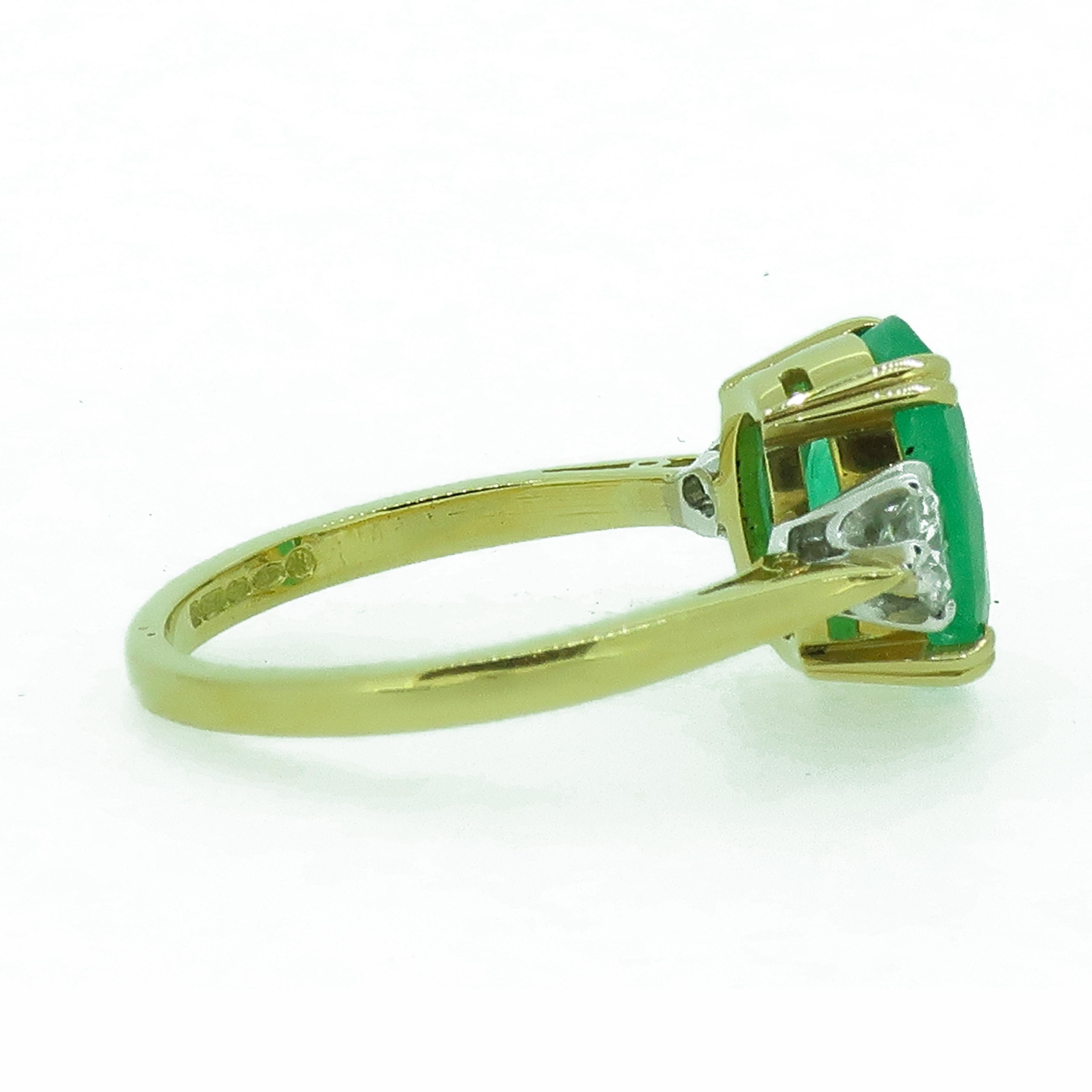 Oval Cut Oval Emerald and Diamond Three-Stone Ring 18 Karat Yellow and White Gold