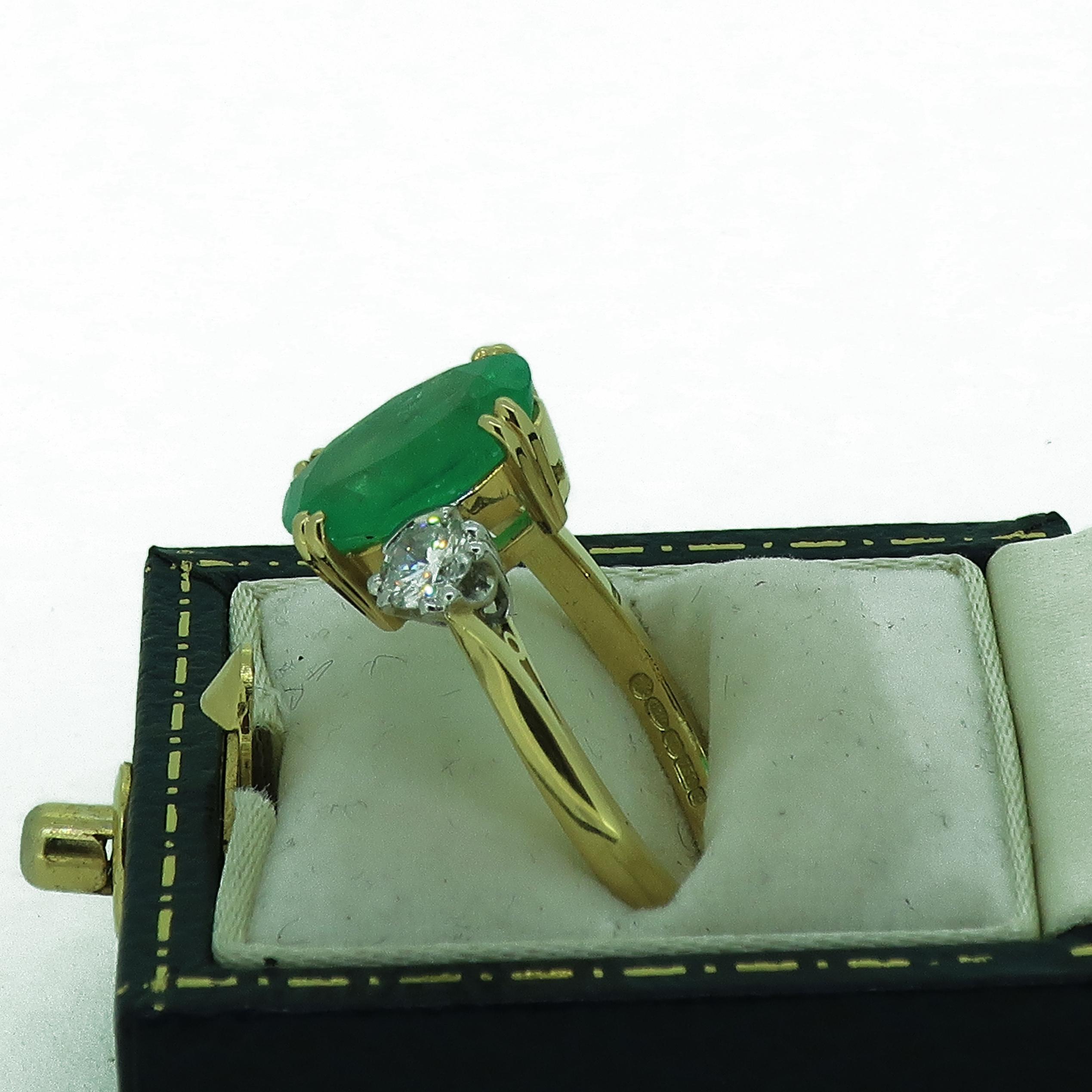 Women's Oval Emerald and Diamond Three-Stone Ring 18 Karat Yellow and White Gold