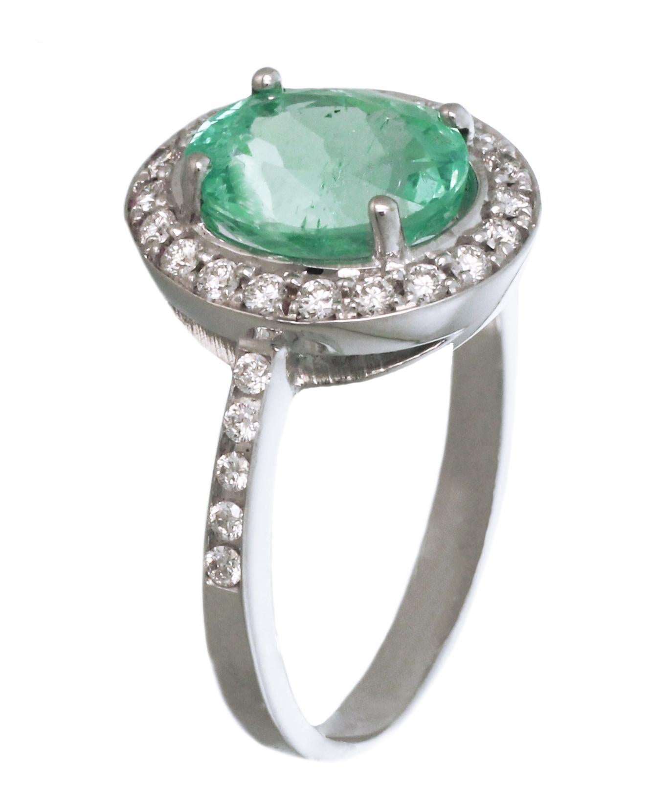 18K White Gold, Diamonds and 2,56 Carat Emerald Ring.
This Ring is made in 18K White Gold, Emerald and Diamonds ( see below technical features). 
The emerald is a very clean Colombian emerald, high quality emerald. 

Technical features: 
- Diamonds: