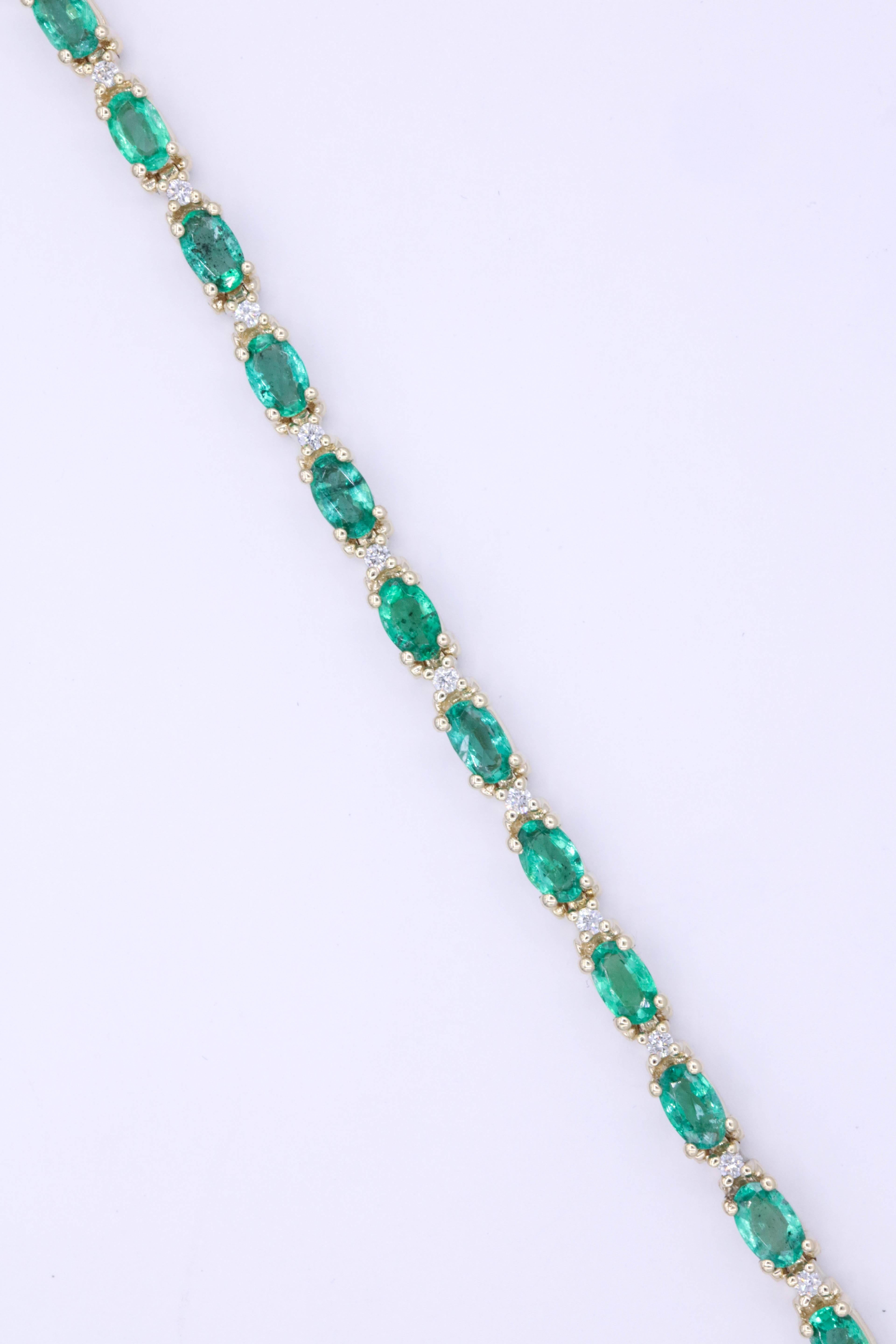 emerald and diamond tennis bracelet 14k