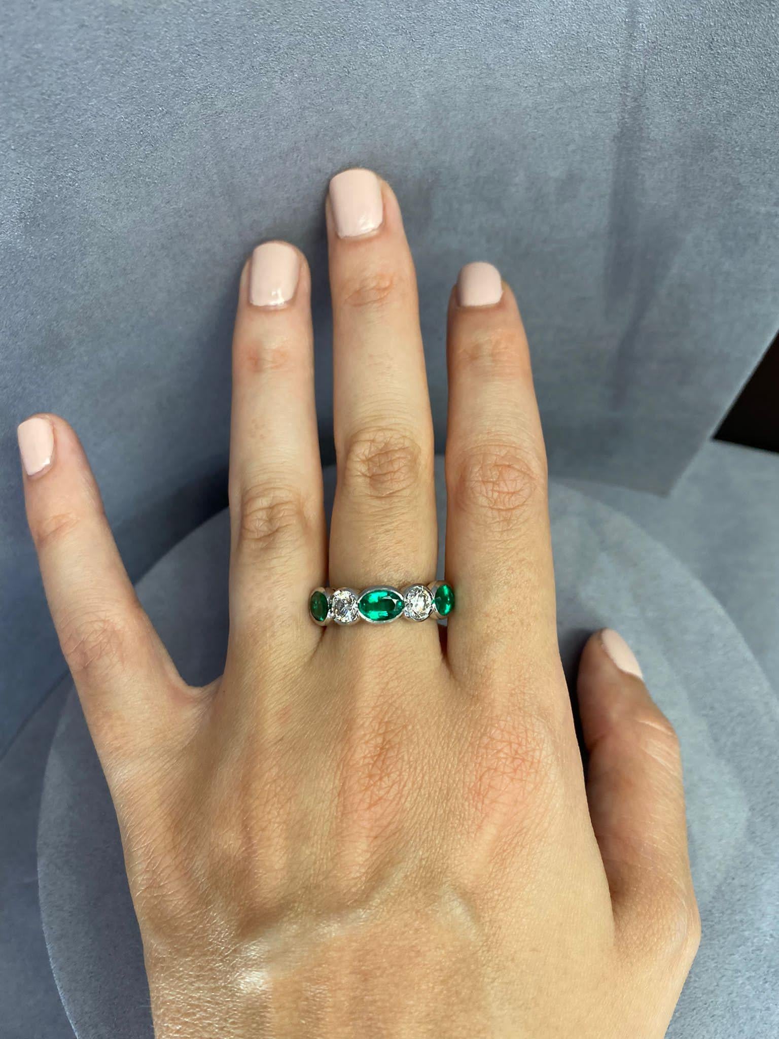 Women's or Men's Oval Emerald and Round Diamond Five Stone Platinum Ring For Sale