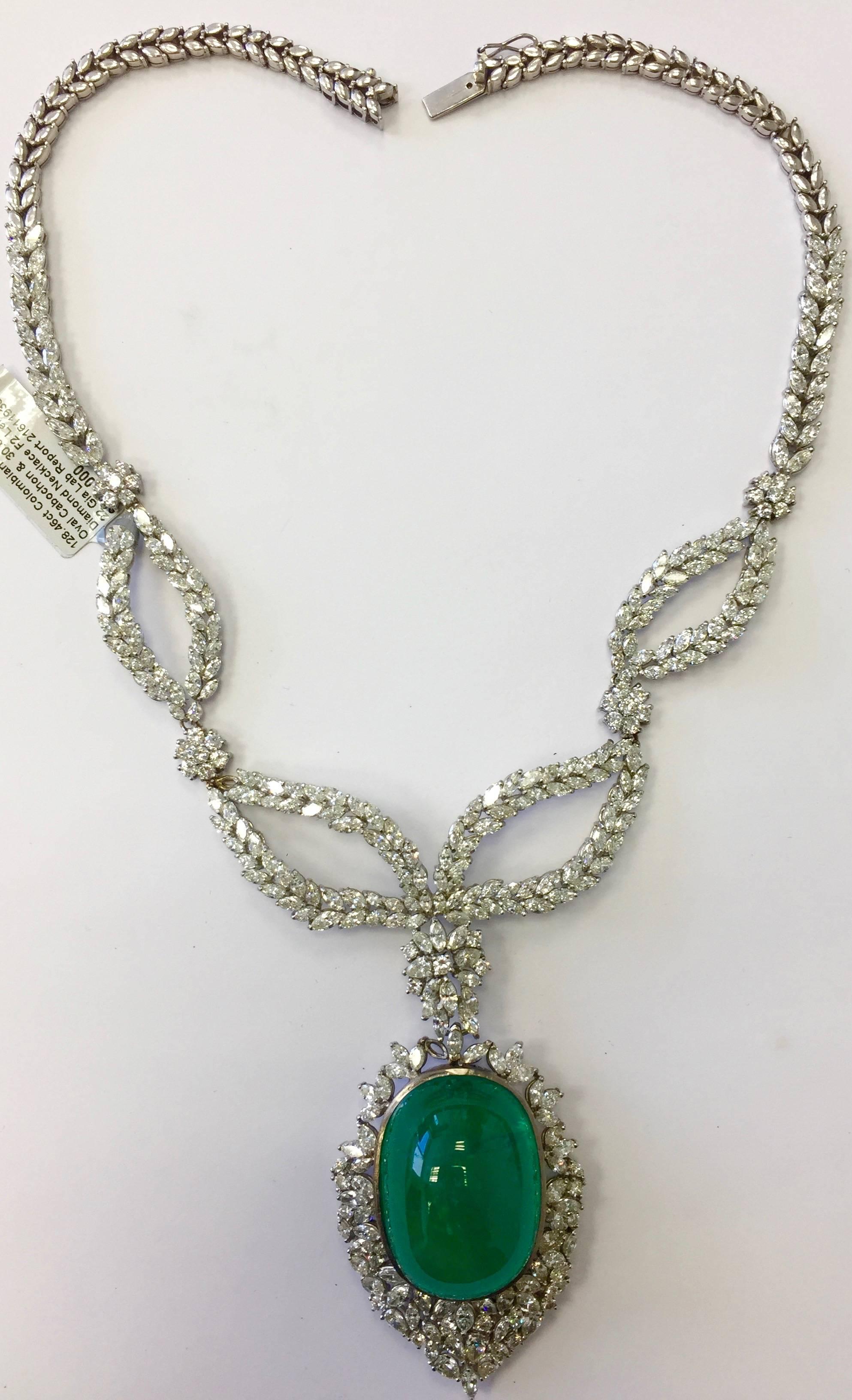 Gorgeous emerald cabochon and diamond necklace featuring a 128.46 ct emerald cabochon with 30.00 ct of diamonds! This piece is exquisite and perfect for someone who really loves jewelry. This necklace was once owned by the princess of Bahrain. 
It's