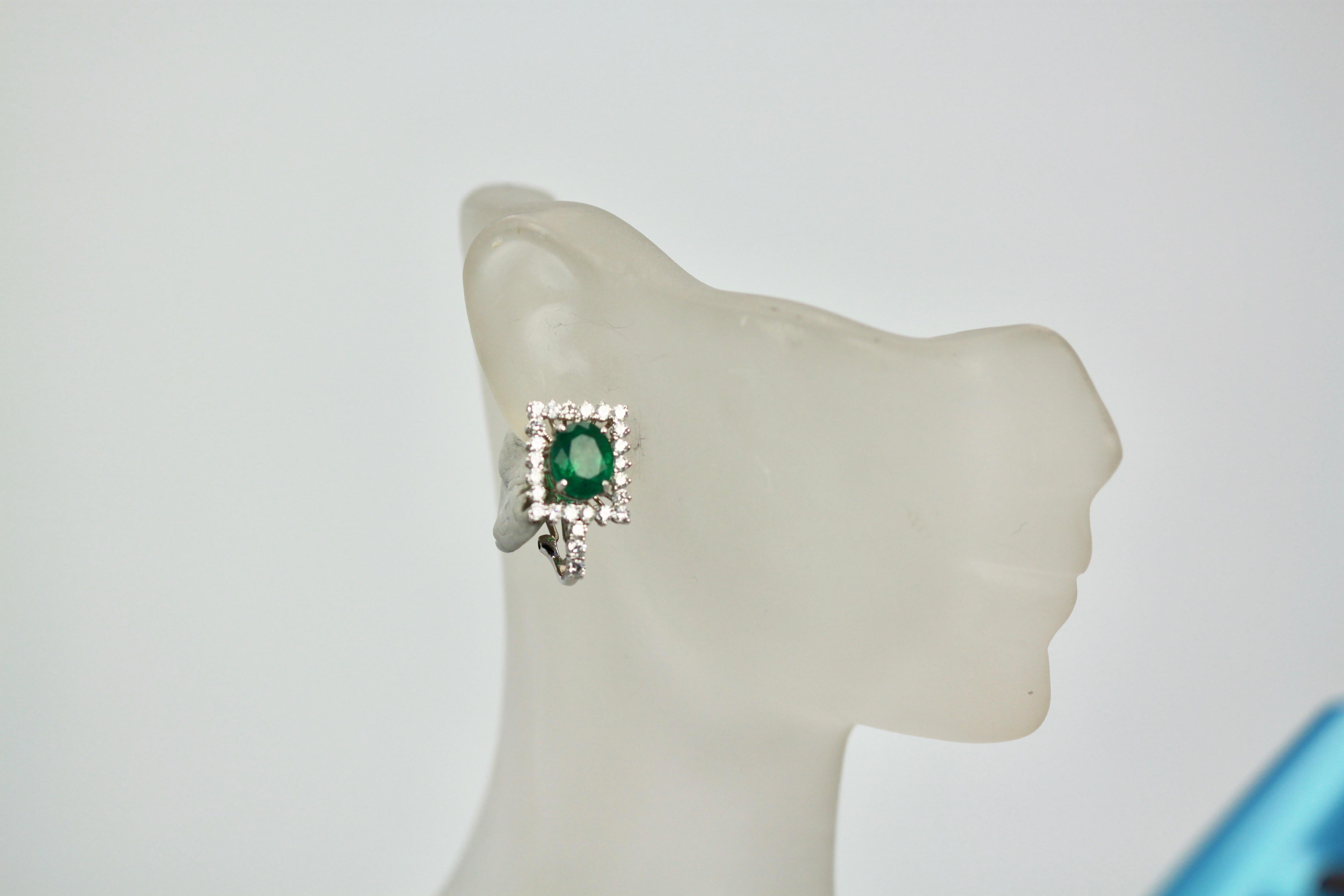 Women's Oval Emerald Diamond and 18 Karat White Gold Earrings 5.83 Total Carat Weight For Sale