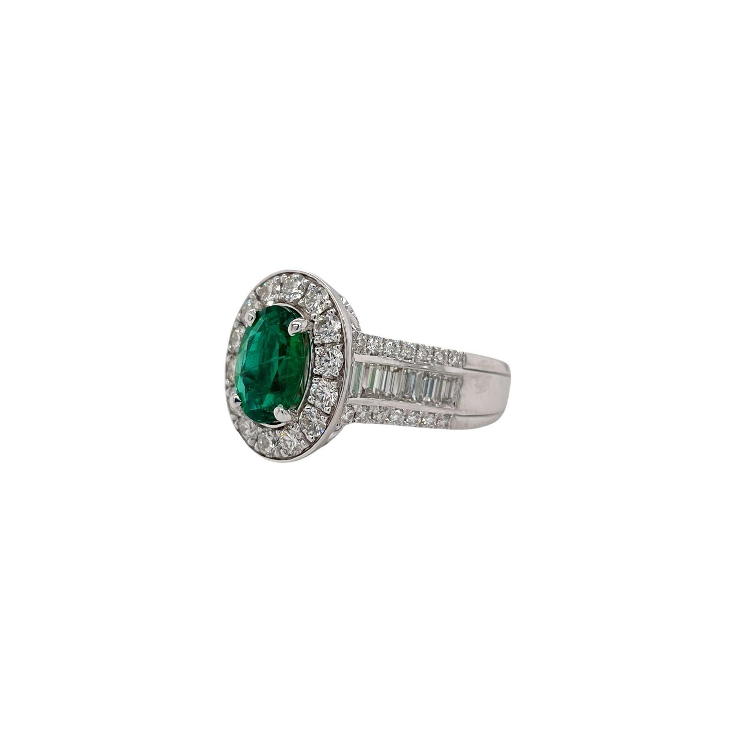 Contemporary Oval Emerald & Diamond Halo Ring in 18K White Gold For Sale