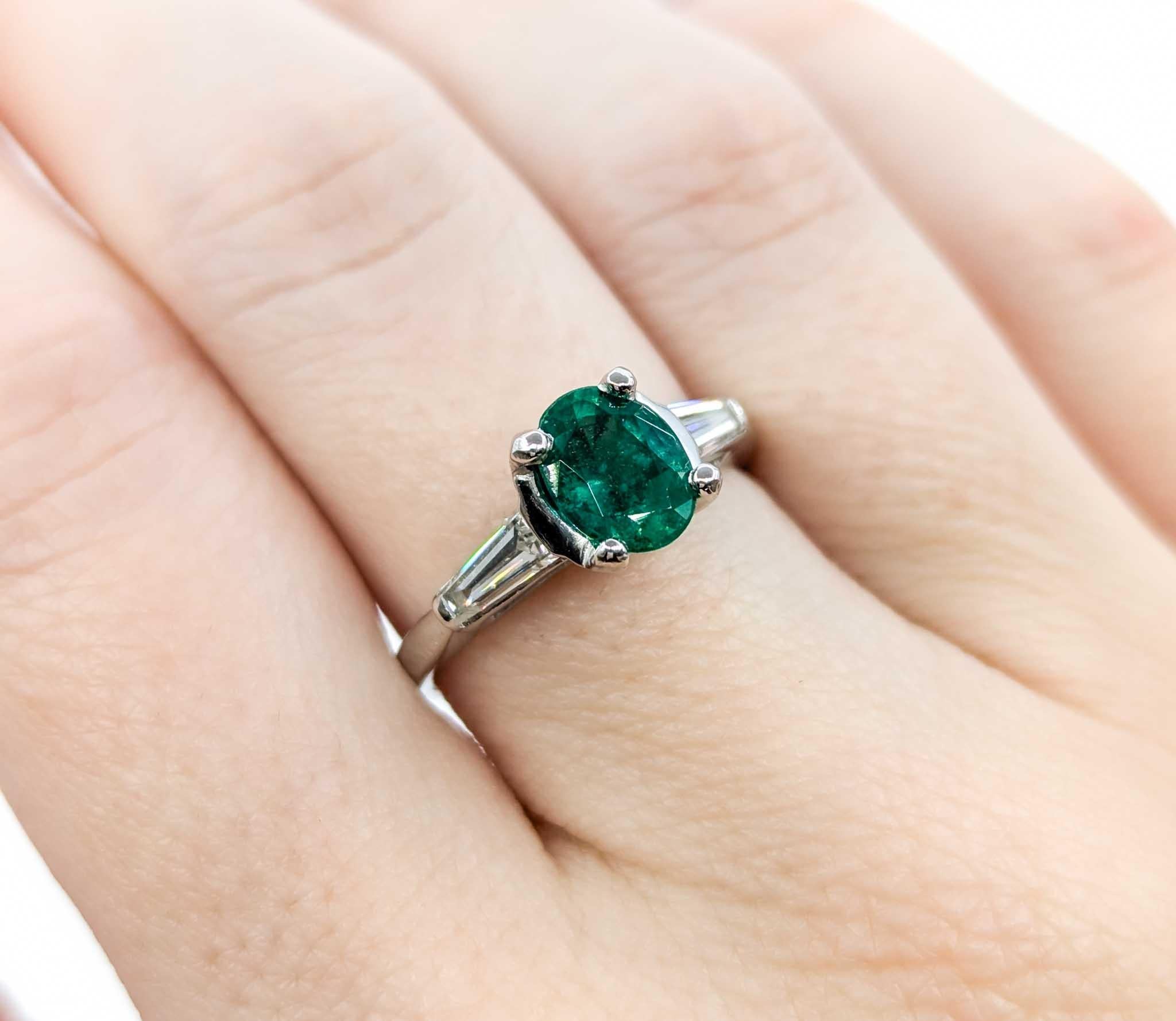 Contemporary Oval Emerald & Diamond Ring in Platinum For Sale